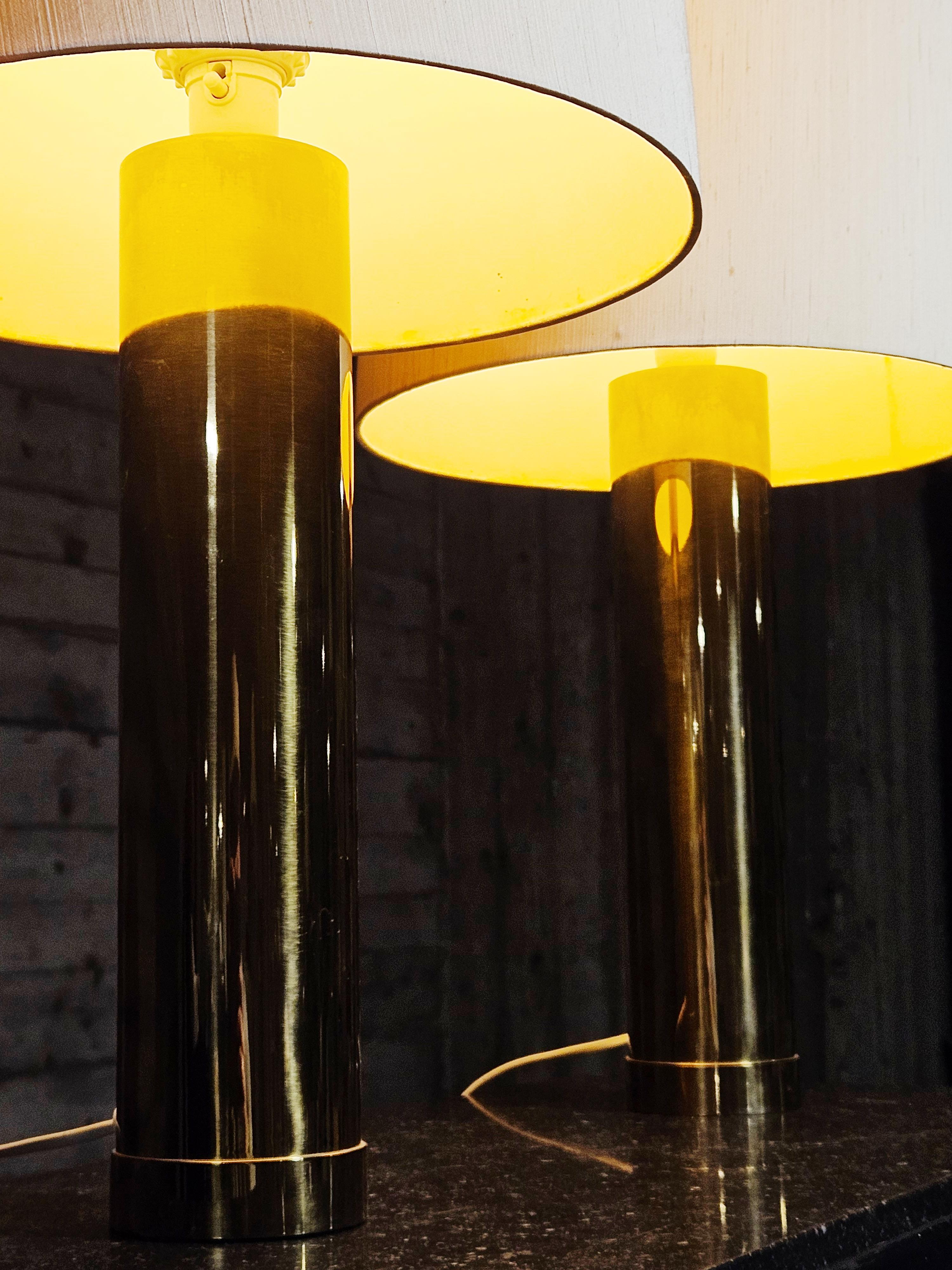 Pair of heavy brass table lamps model 'B-09' produced by Bergboms, Sweden, in the 1960s. Original off white shades with plastic softener on the top. 

Original condition with a good patina. 

