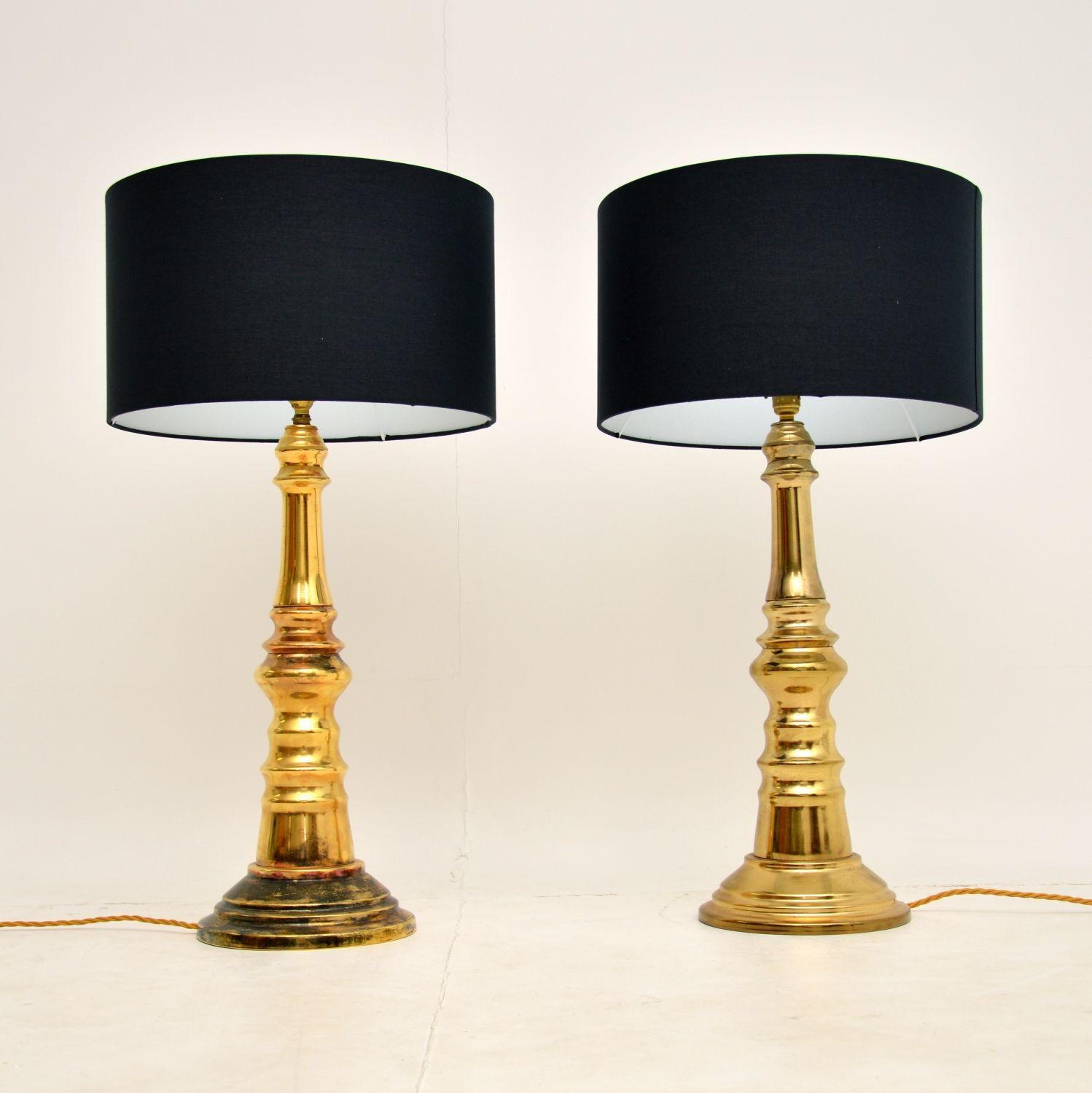 A stylish, large and impressive pair of vintage brass table lamps. These date from the 1970’s, they are in good overall condition.

They are clean and sturdy, with some areas of tarnishing to be seen, mostly on the base of one lamp. We have had