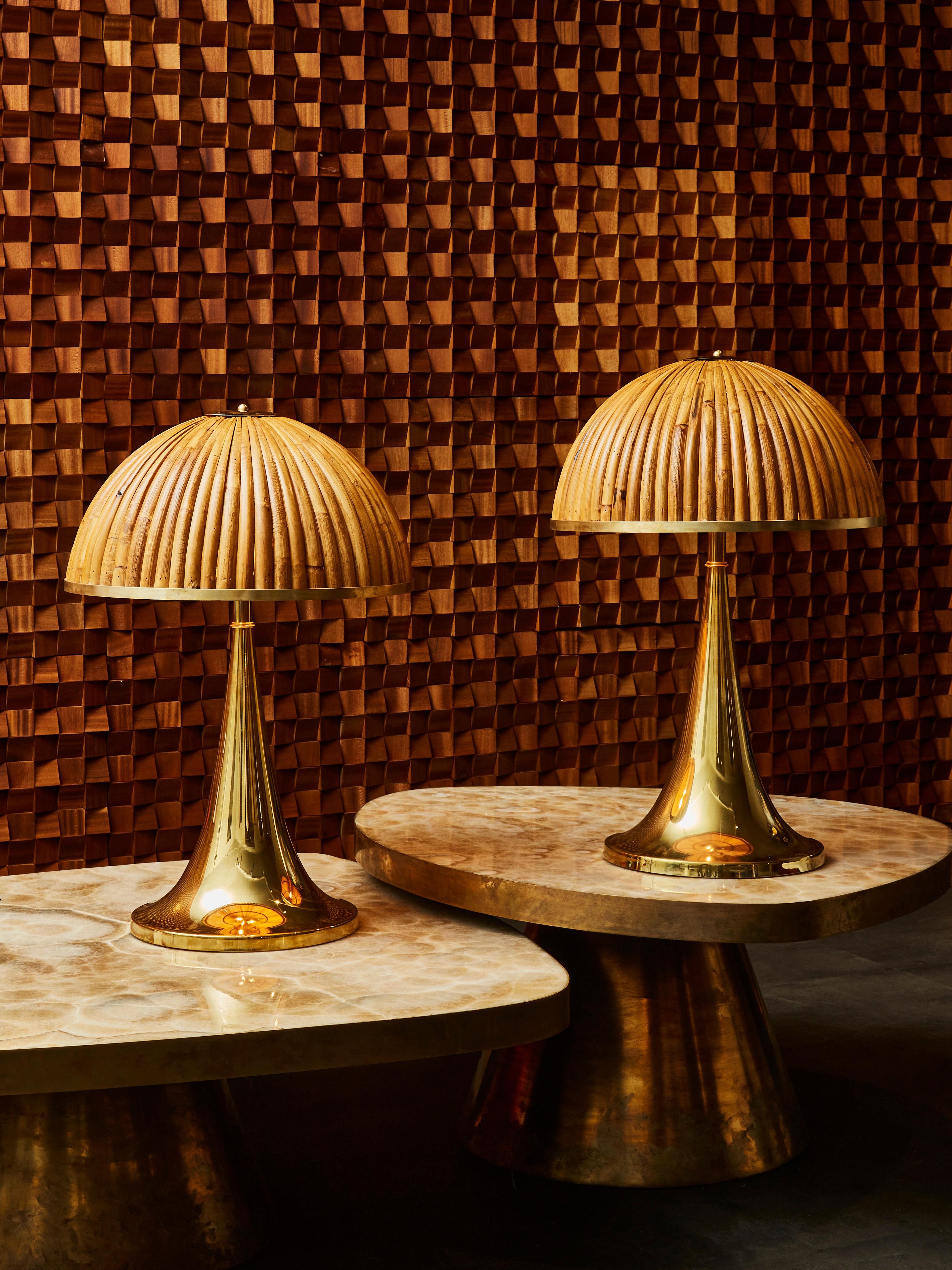 Pair of trumpet shaped brass table lamps toped with beautiful mid century style wood shades.