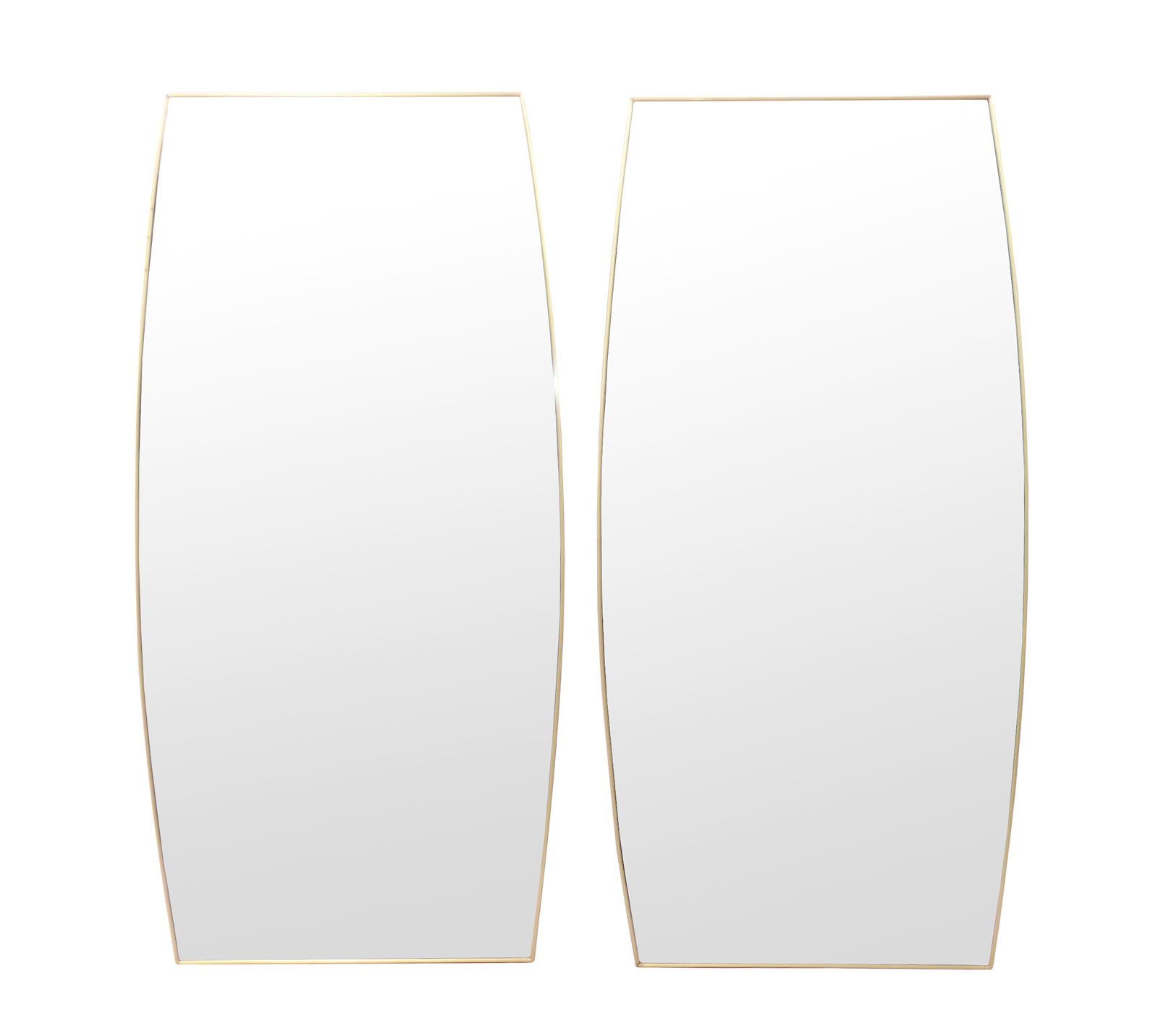 Pair of Brass Tone Cushion Cut Modernist Mirrors, American, circa 1960s. They are priced at $850 each or $1500 for the pair. They are believed to be constructed of brass toned anodized aluminum frames with cushion cut mirrors. 