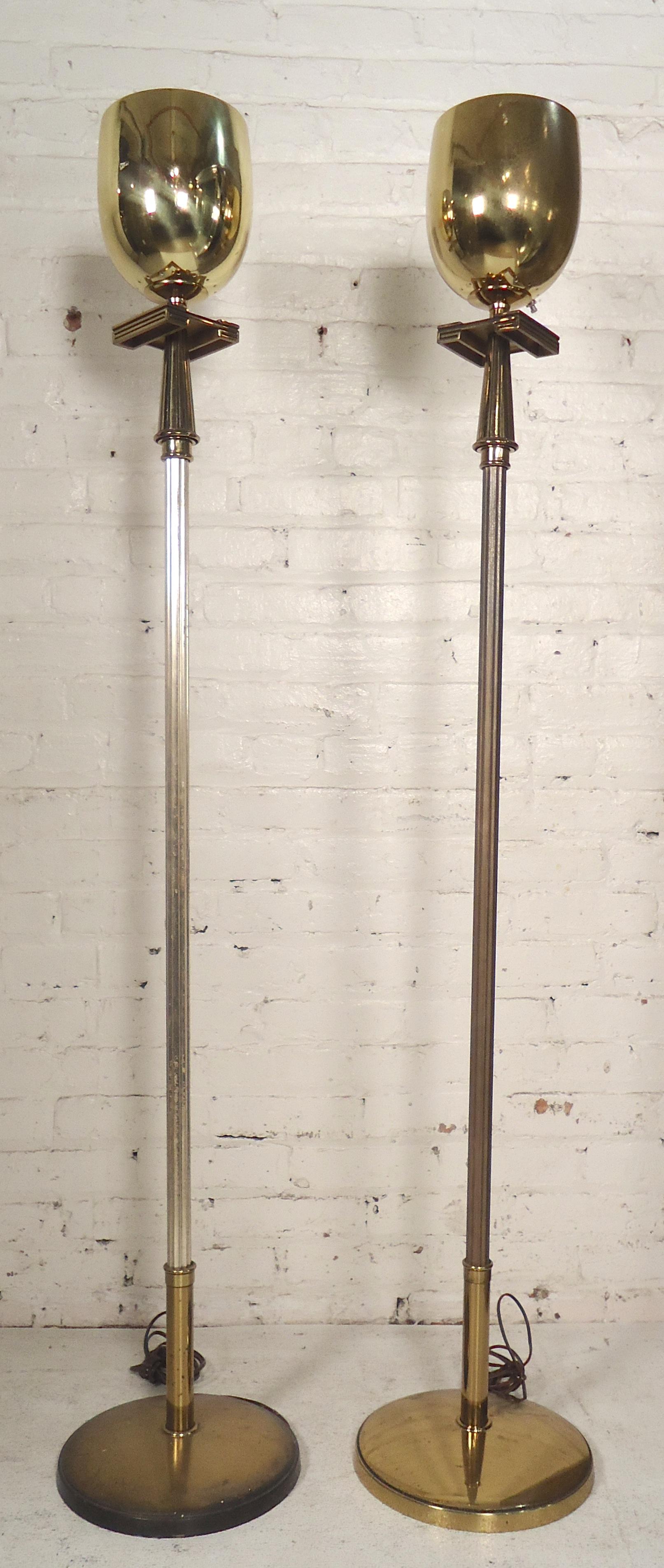 Mid-Century Modern brass floor lamps with up lighting. Attractive detailing throughout.

(Please confirm item location - NY or NJ - with dealer).
 
