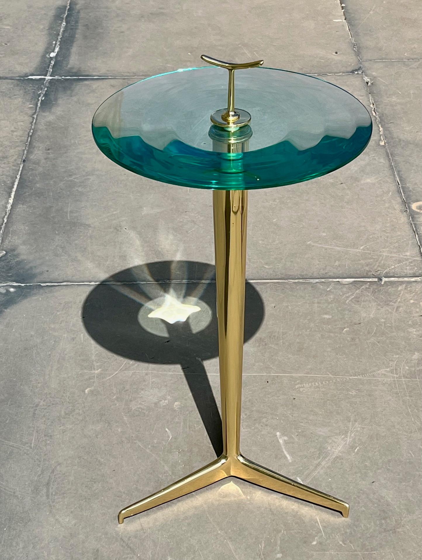 Brass Pair of brass tripod tables with lens glass tops . Italy, late 20th century  For Sale