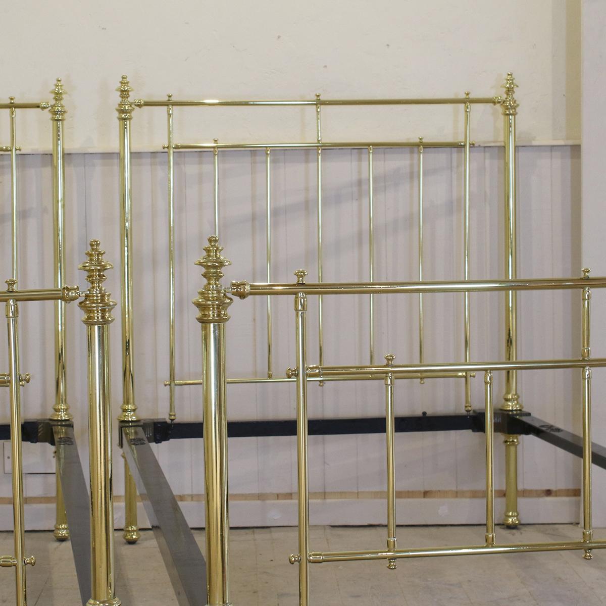 A matching pair of twin all brass antique beds in brass with fine brass panels and decorative cast finials.

These beds accept 42 inch wide bases and mattresses (large single - 3ft 6in).

The price is for the bed frames alone. The bases,