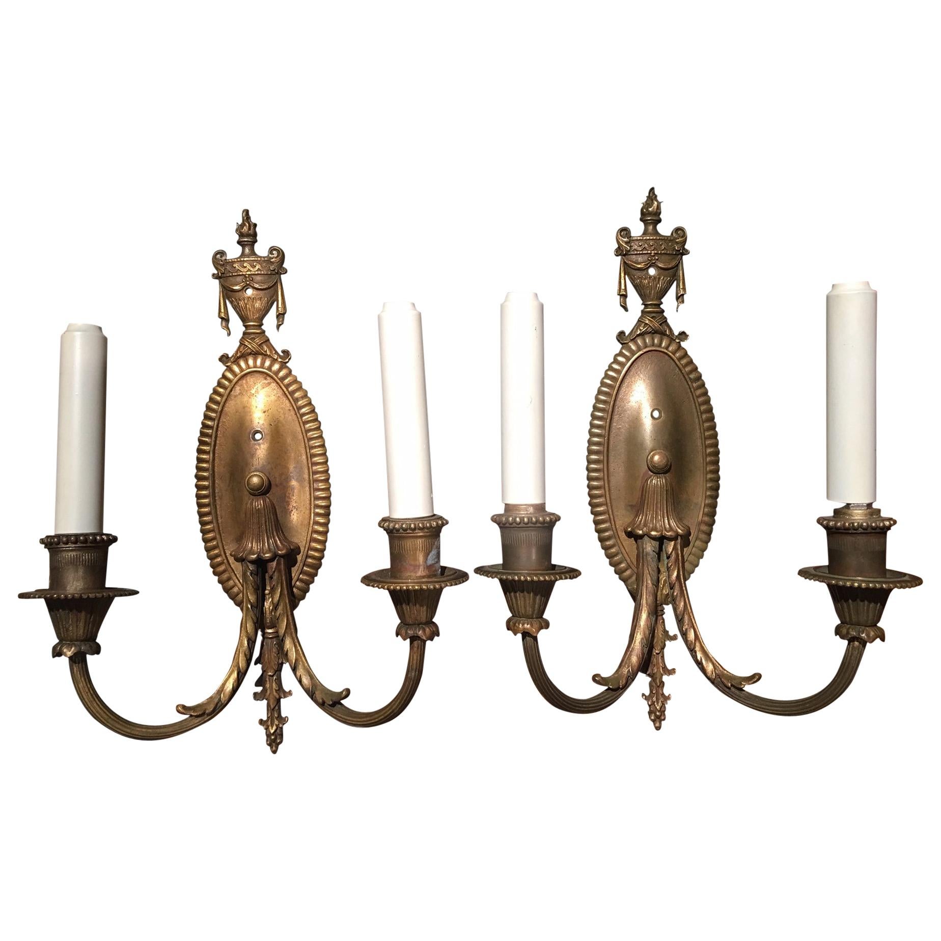 Pair of Brass Two-Light Oval Back with Urn Top Sconces, Late 19th Century