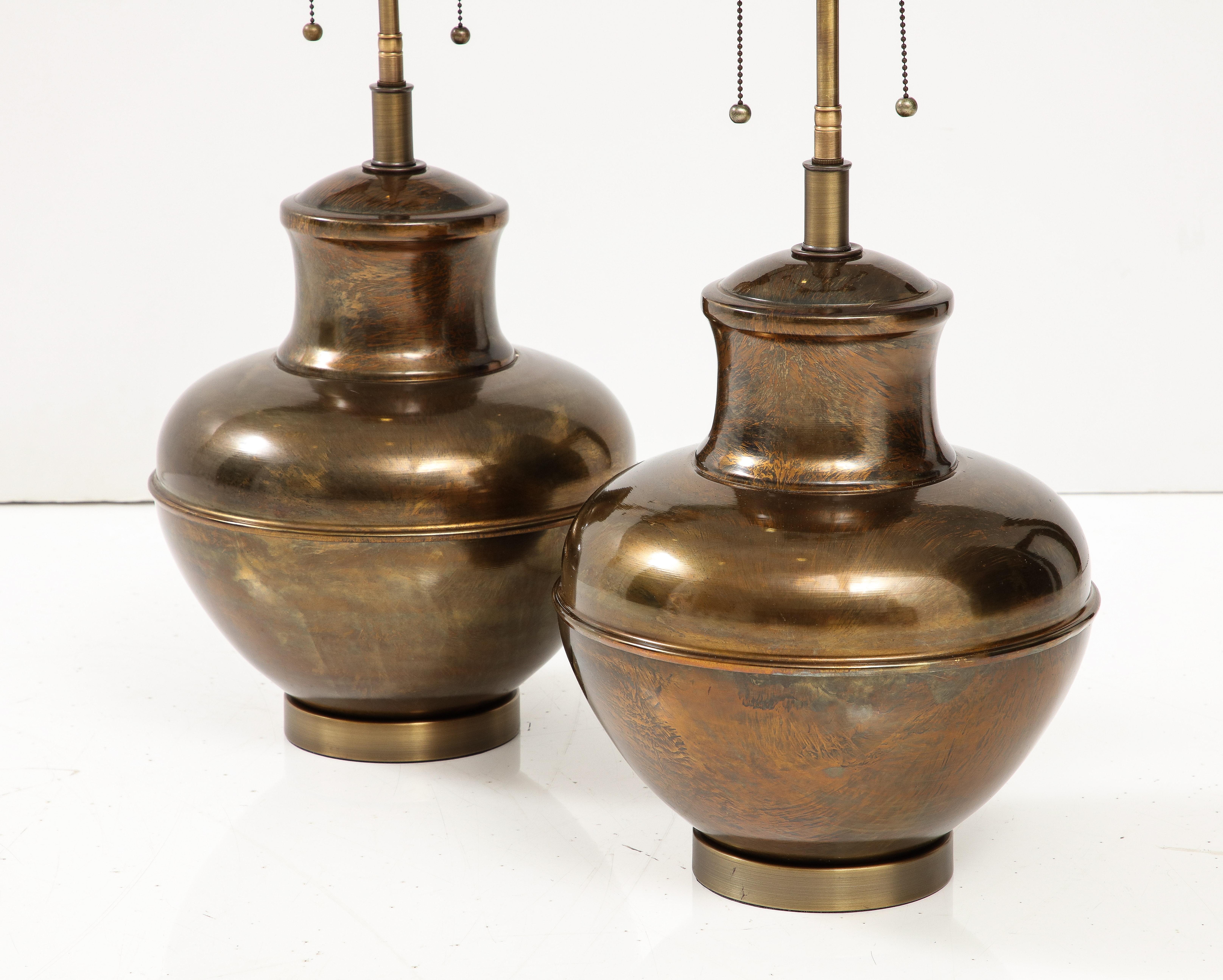 Mid-Century Modern Pair of Brass Urn Shaped Lamps. For Sale