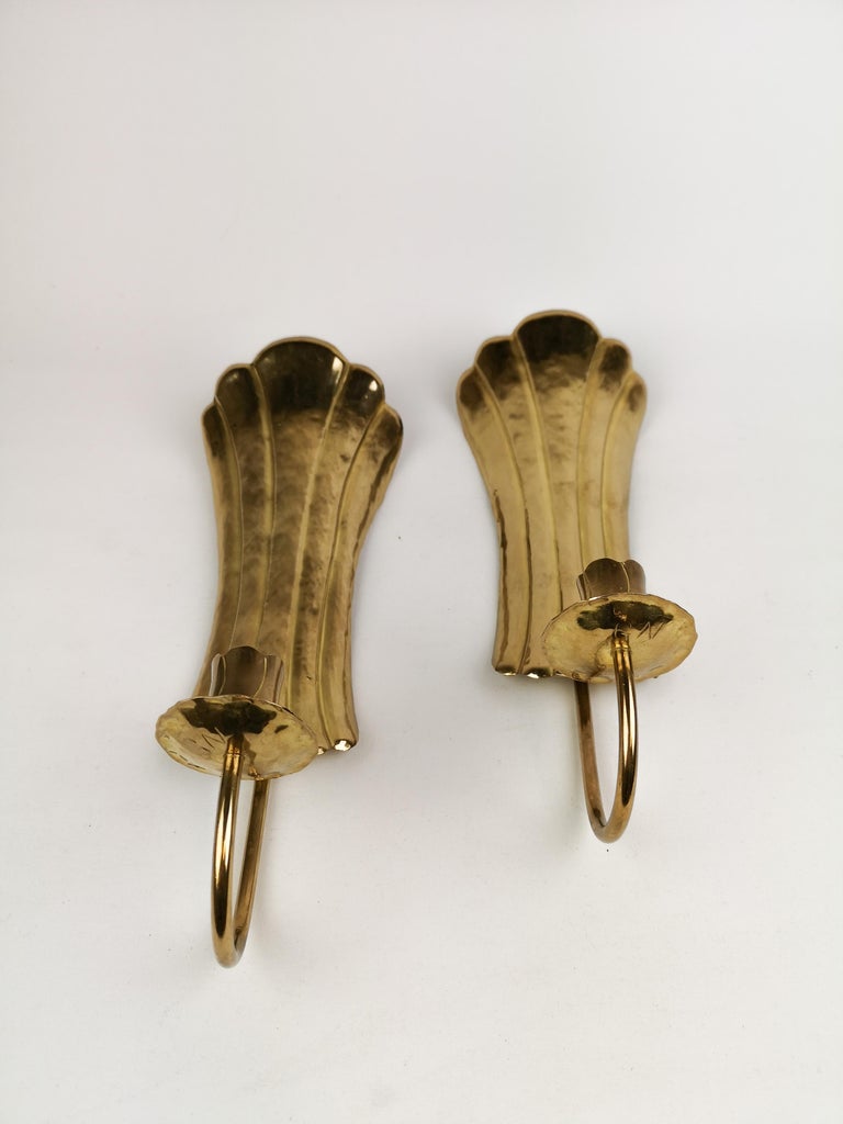 These Wall Candlesticks was hand sculpted in Arvika Sweden. They are in the same shape and form as the Candlesticks made in brass by famous Holmström Arvika, these ones has the initial of G.N.
Gives a nice shine when a candle is lit.

Nice