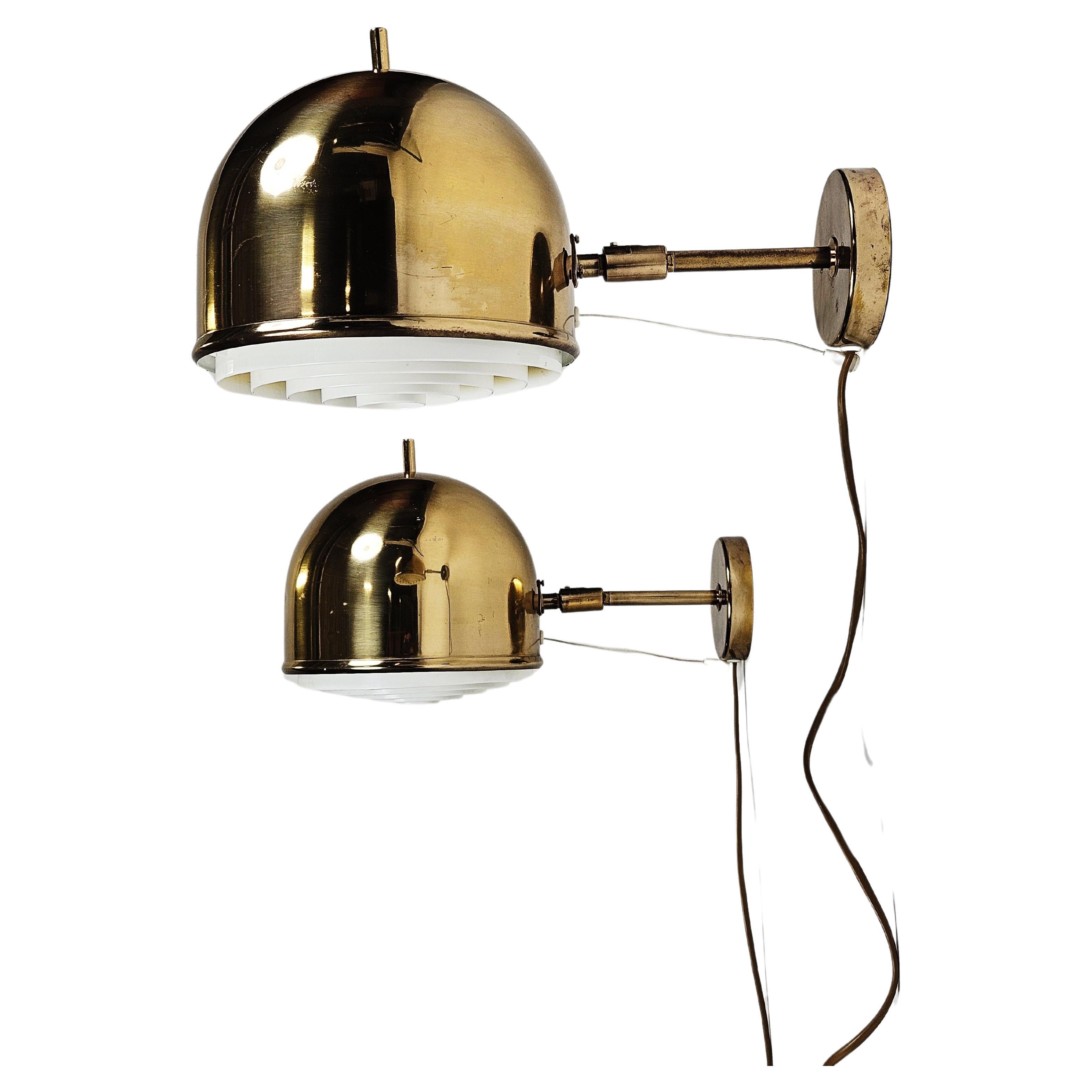 Pair of brass wall lamps 'V-75S' by Eje Ahlgren for Bergboms, Sweden, 1960s