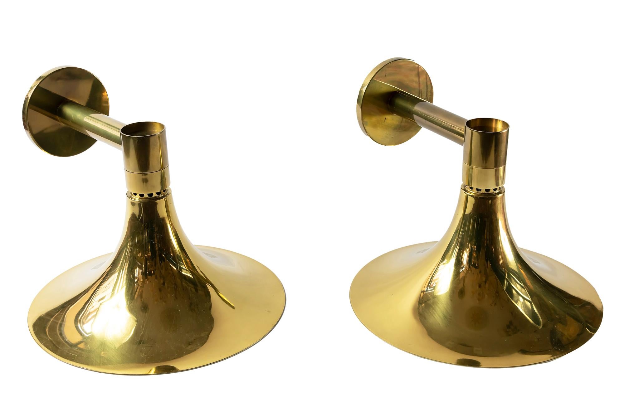 Pair of wall light sconces made of brass with inside surface in white color.
Bulbs are E27 (1 pieces in each sconce).