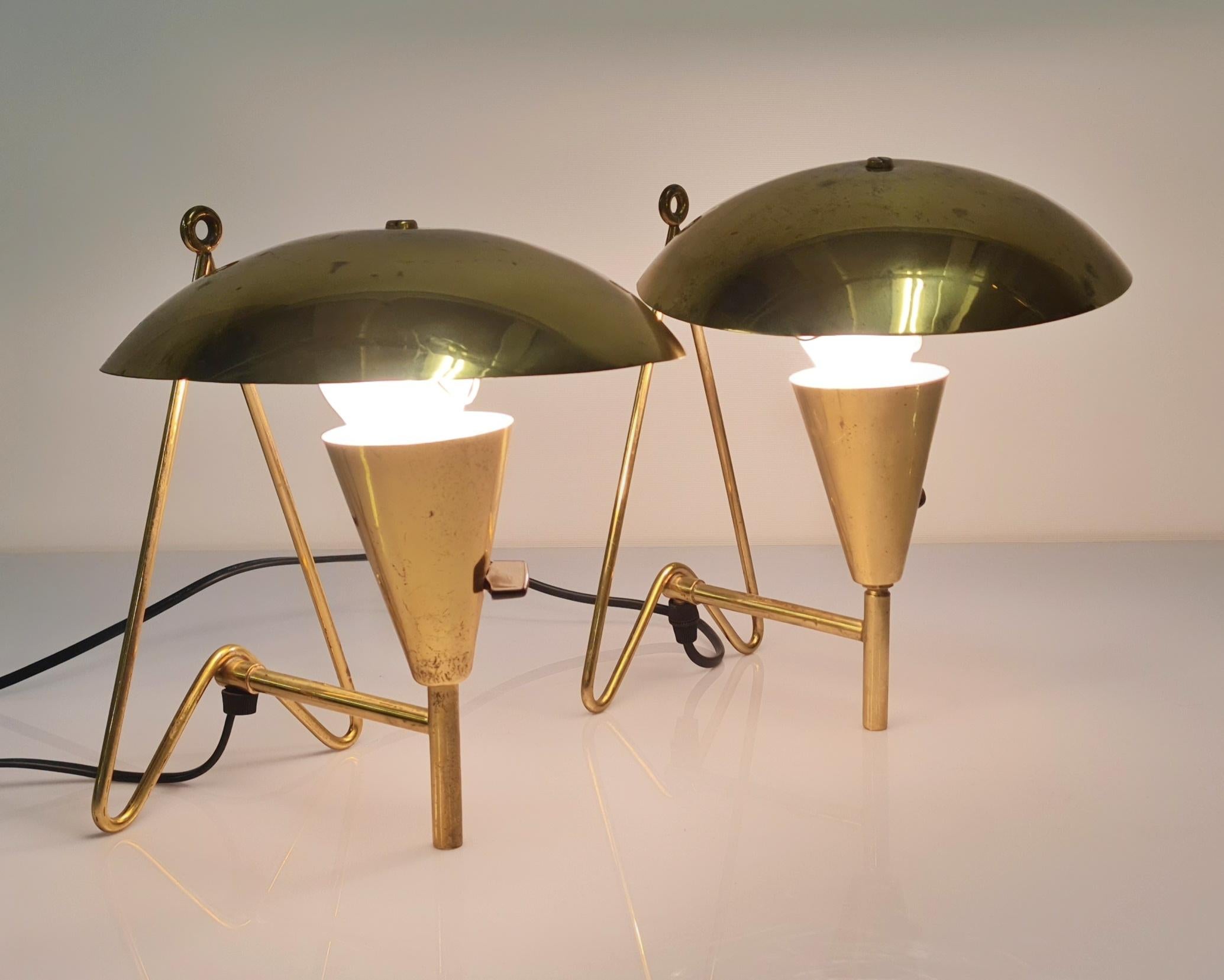 A nice pair of table lamps in full brass, made by Itsu in Finland in the 1950s. The very distinct design and the full brass body make the lamps stand out. Both lamps are in good original condition with some lite patina. 

Itsu was one of the leading
