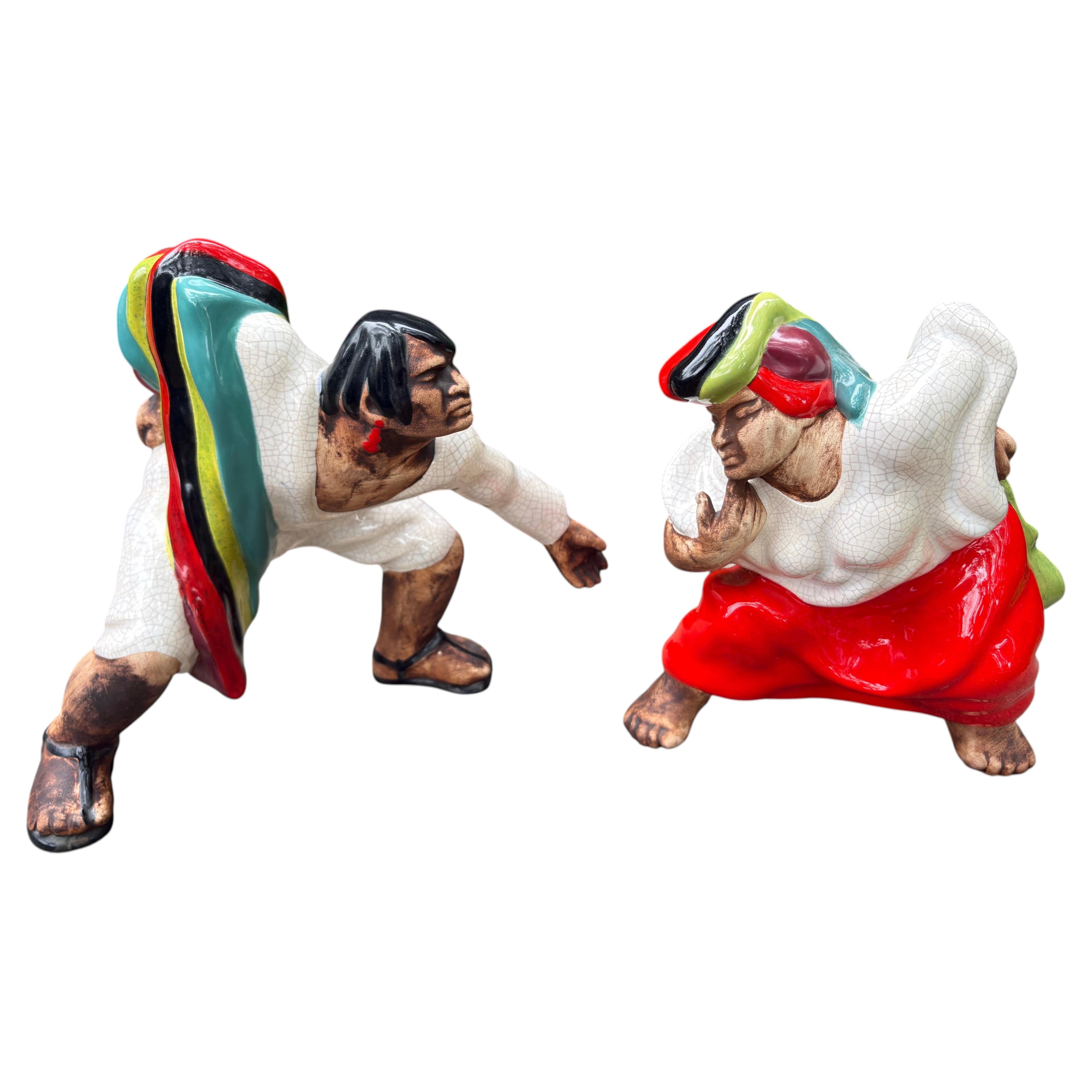 Coppia di figure in ceramica smaltata di Brayton Laguna