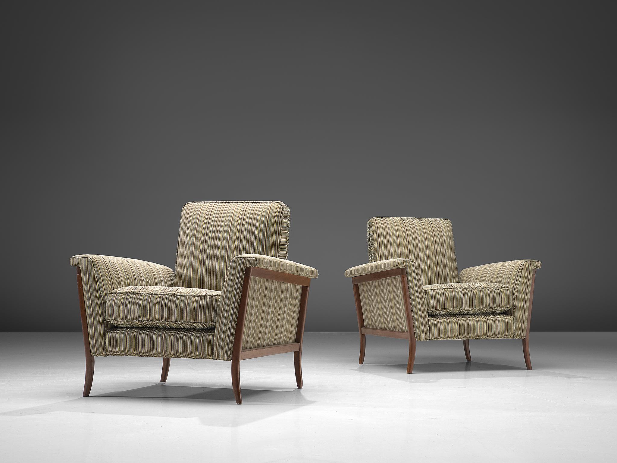 Pair of lounge chairs, mahogany, fabric, Brazil, 1960s.

Elegant pair of Brazilian club chairs. The curved frame is made of mahogany and beautifully exposed on the outside of the shell. The smaller high back adds more elegance to the design. A