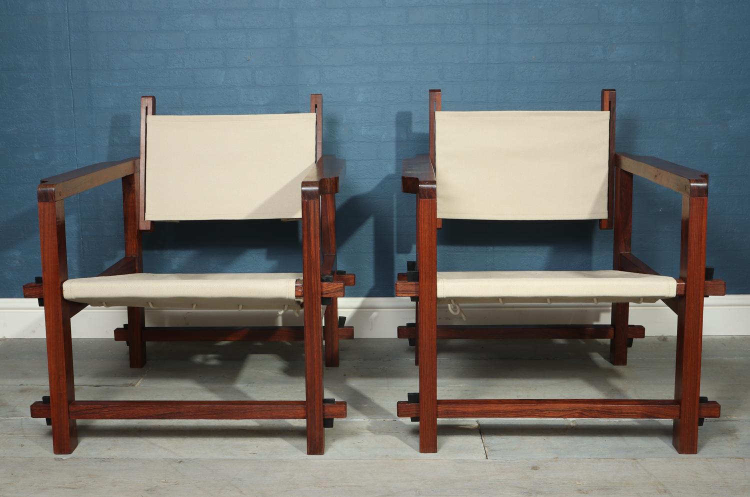 Pair of Brazilian midcentury sling chairs
A pair of Brazillian produced midcentury sling chairs solid rosewood with peg joints and re covered upholstery, the chairs are in excellent condition throughout

Age: circa 1960

Style: Mid-Century