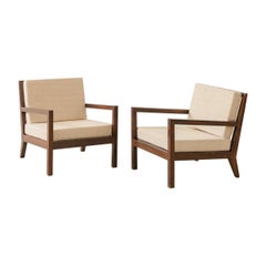 Paire de fauteuils brésiliens du milieu du siècle dernier en bois de rose massif, designer inconnu, années 1960