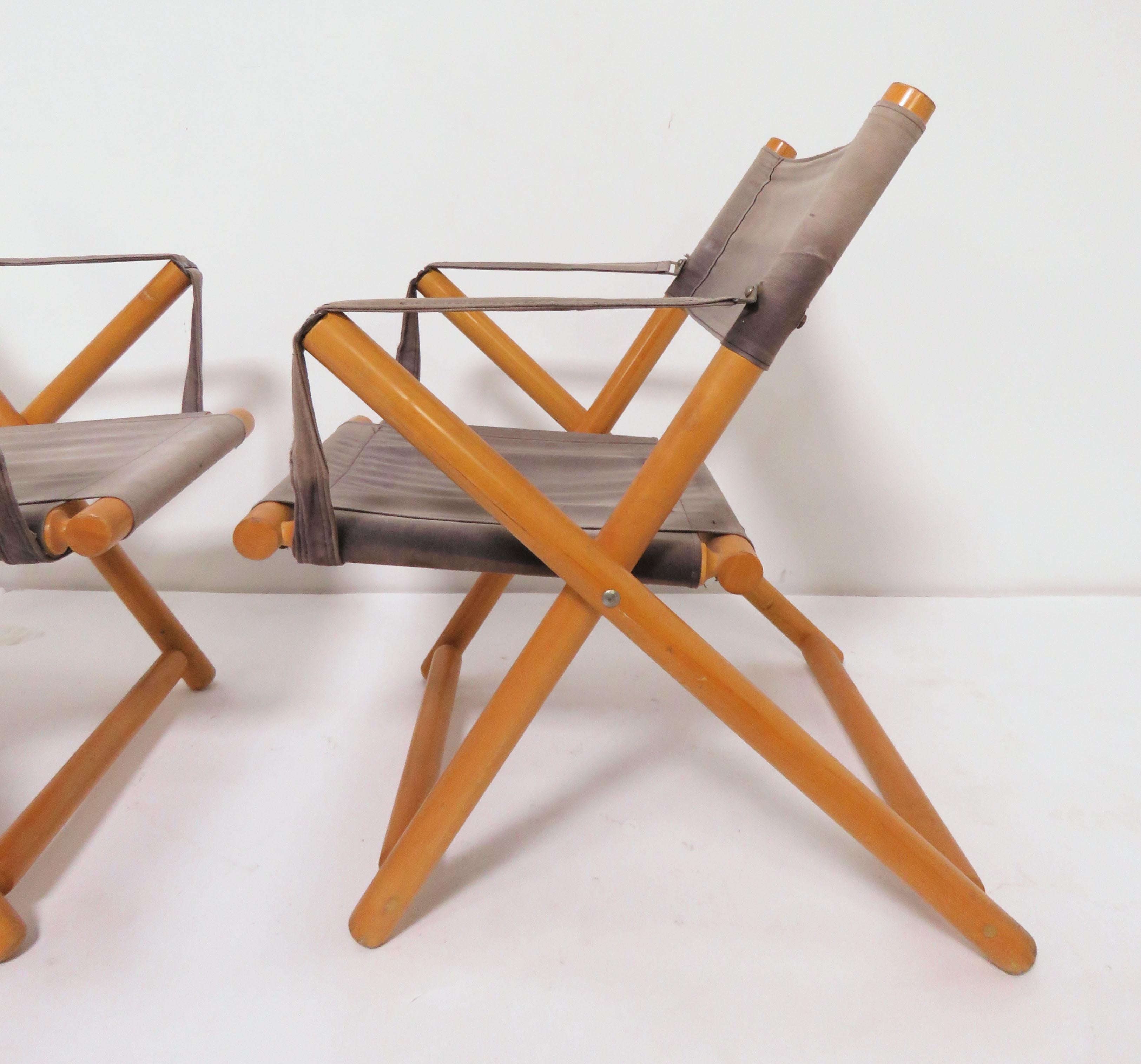 An elegant pair of folding safari chairs with original canvas slings, made by the Gerdau Furniture Co. of Brazil in the early 1970s.