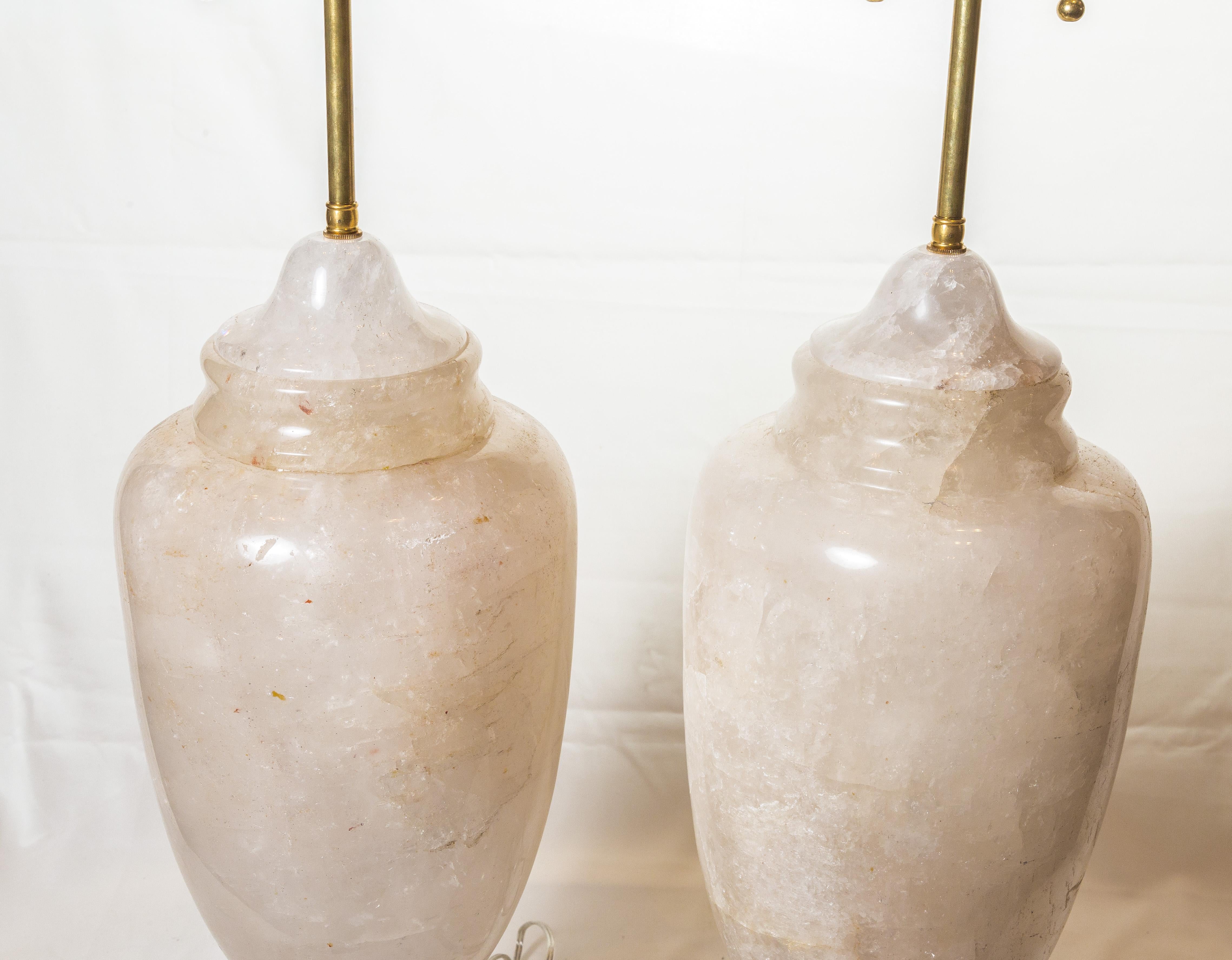 Pair of large rock crystal lamps, with a clear acrylic base of 8