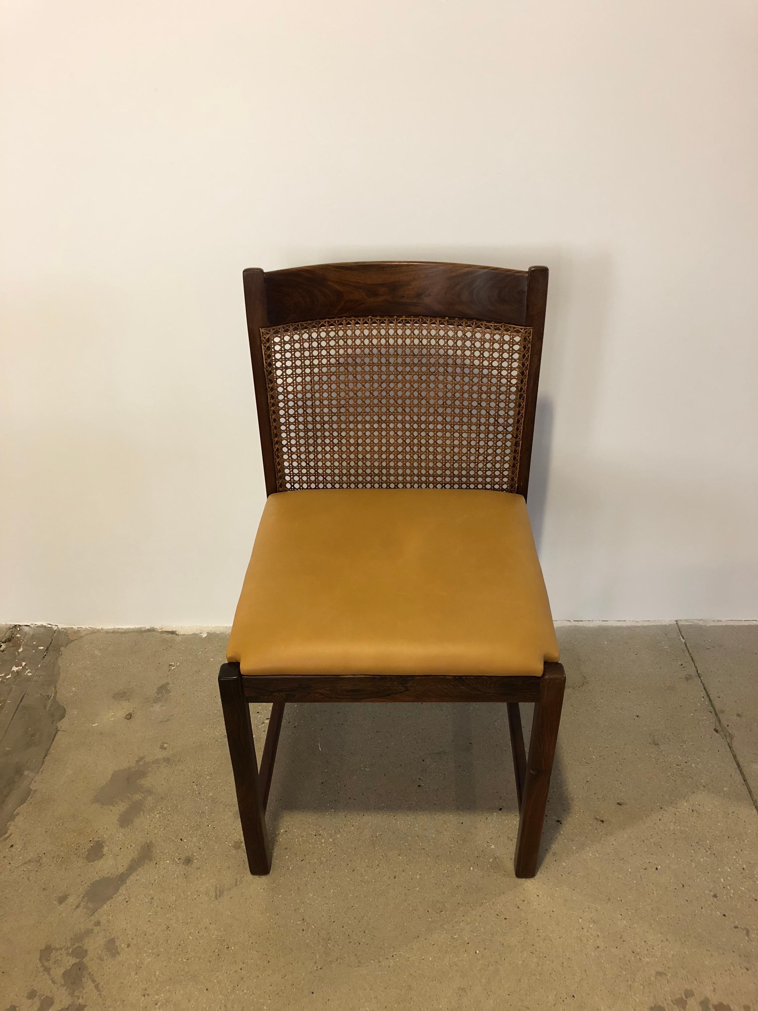 Pair of Brazilian Rosewood Chairs with Original Caned Backs and Leather Seats In Good Condition In New York, NY