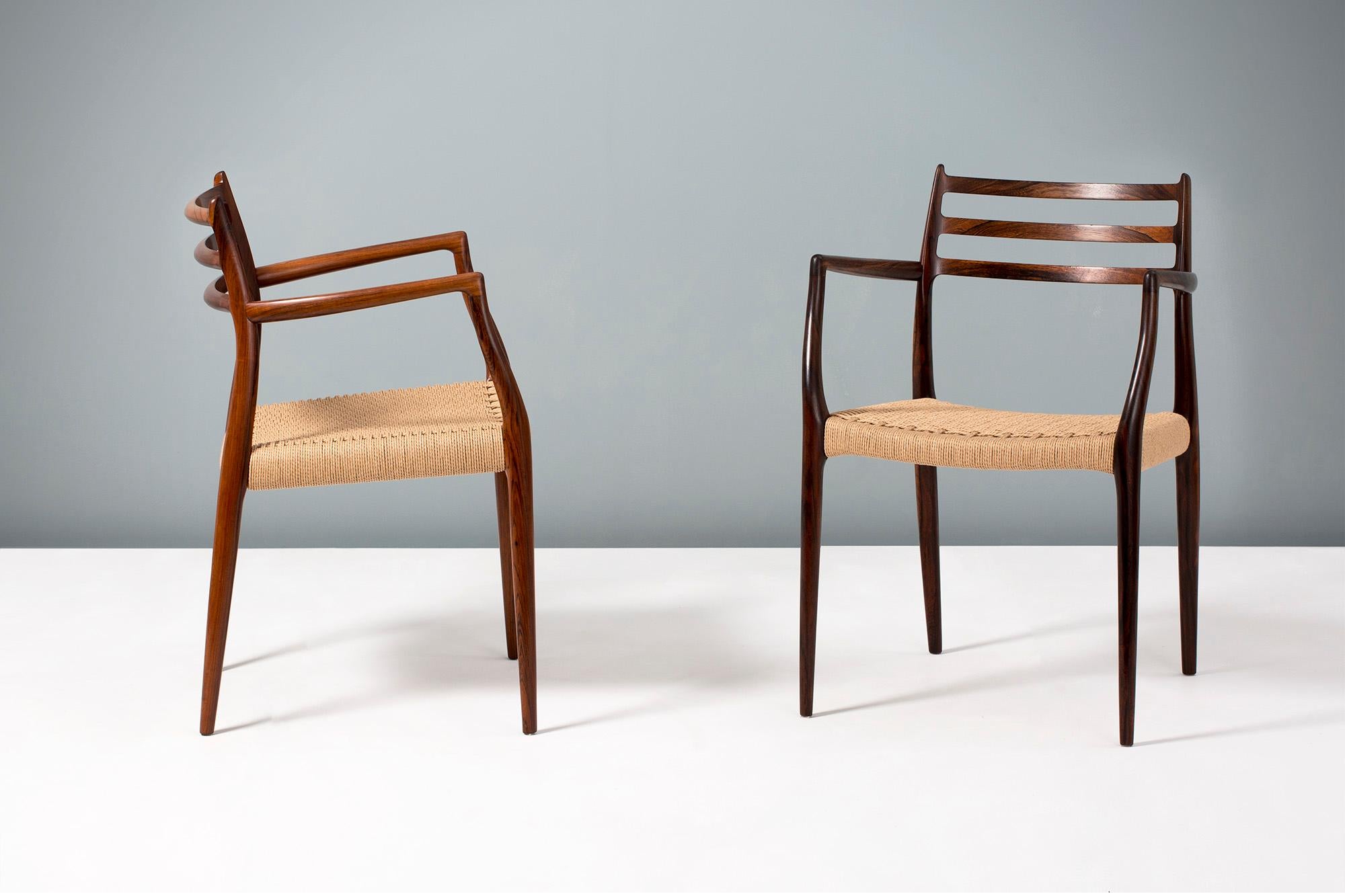 Niels Moller

Pair of Model 62 Armchairs, 1962.

Rarely seen edition of this iconic design made from exquisite, highly figured Brazilian Rosewood. Designed by Niels Moller for his own company: J.L. Moller Mobelfabrik in Denmark, 1962. These