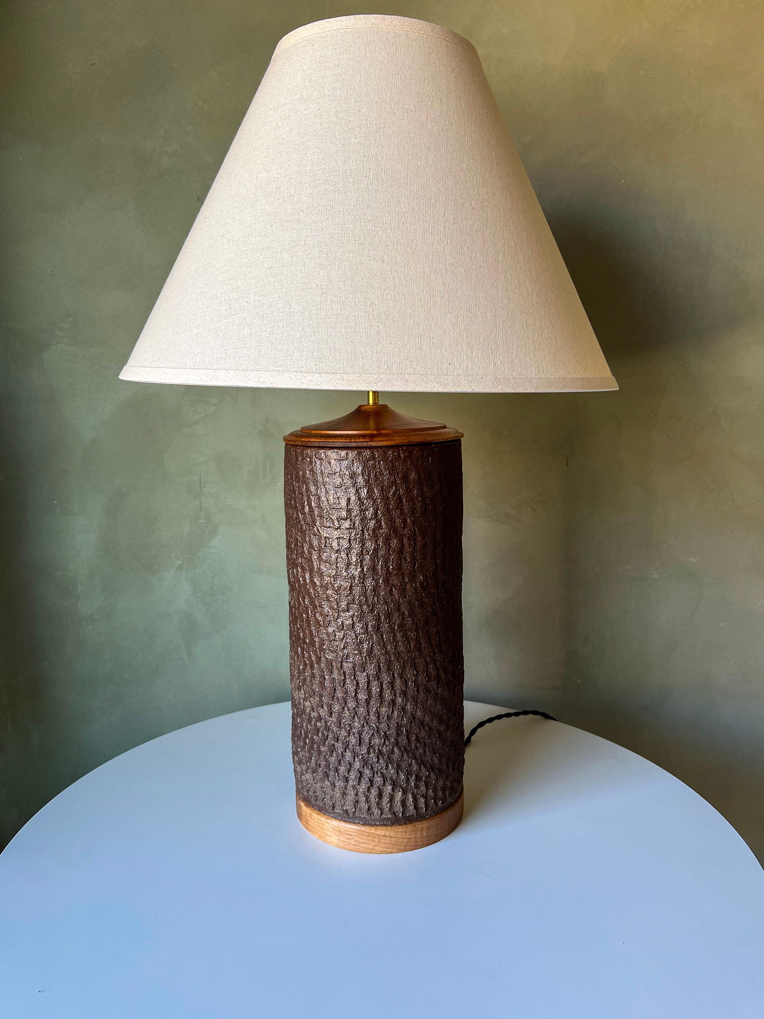 Pair of vintage ceramic table lamps by Brent Bennett. These are vintage pieces, hand-thrown by Brent Bennett. Finials and shade are new production. Ready for use. 
