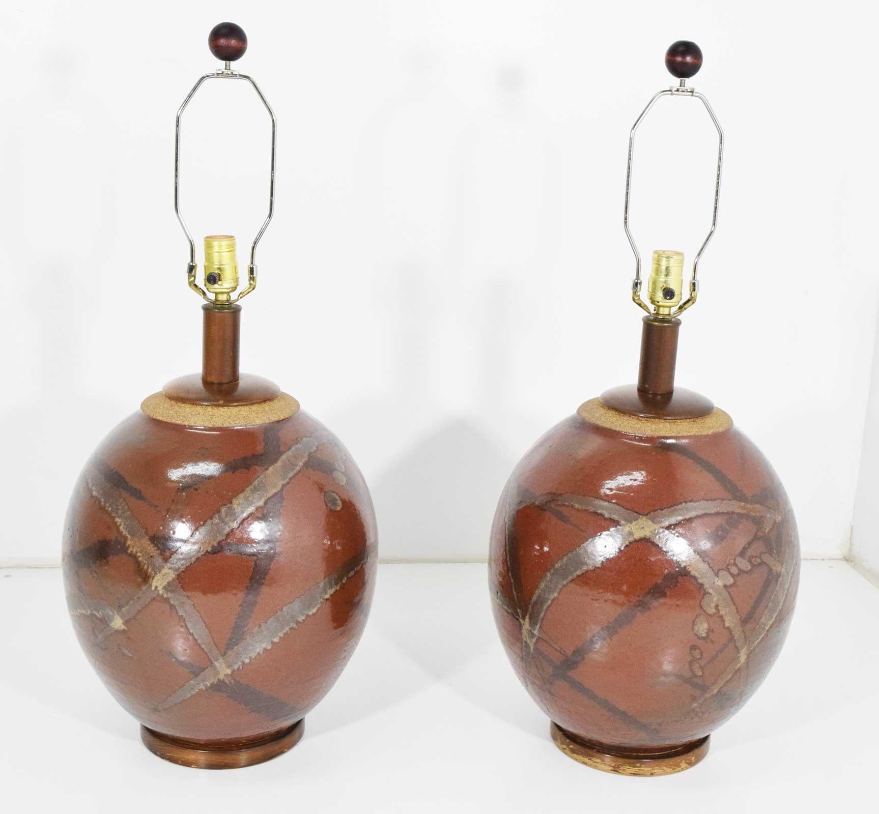 Beautiful pair of ceramic glazed table lamps by Brent Bennett. Shades not included. Height is to top of socket.