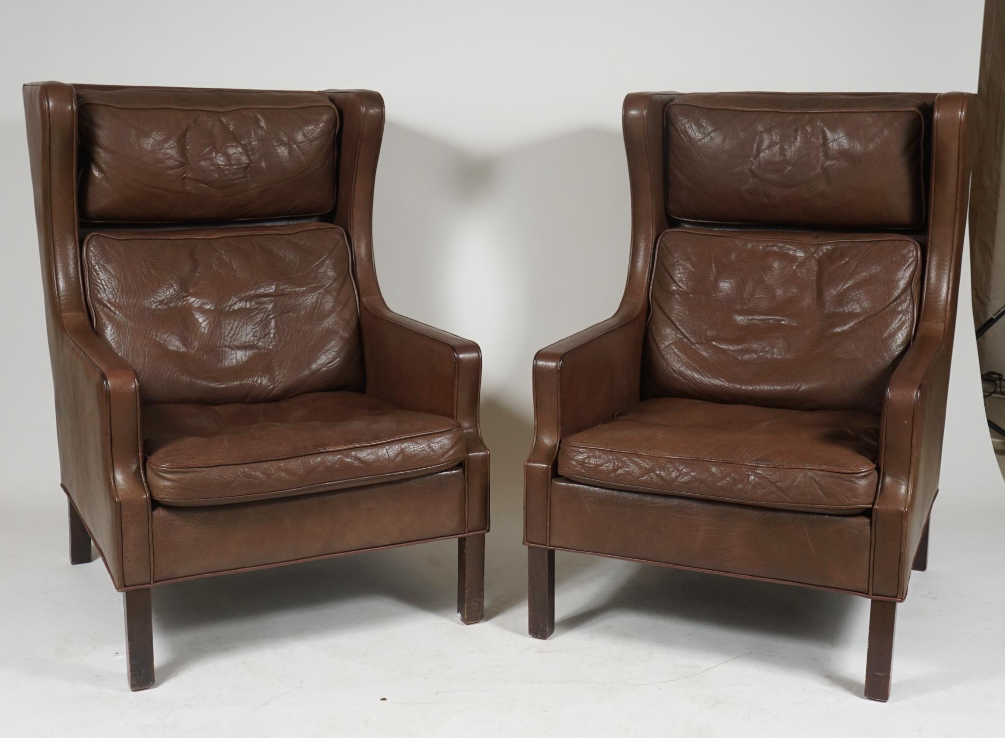 Handsome pair of Børge Møgensen style Danish modern high-backed, wingback armchairs, in dark brown leather. Perfect comfort, Danish elegance.