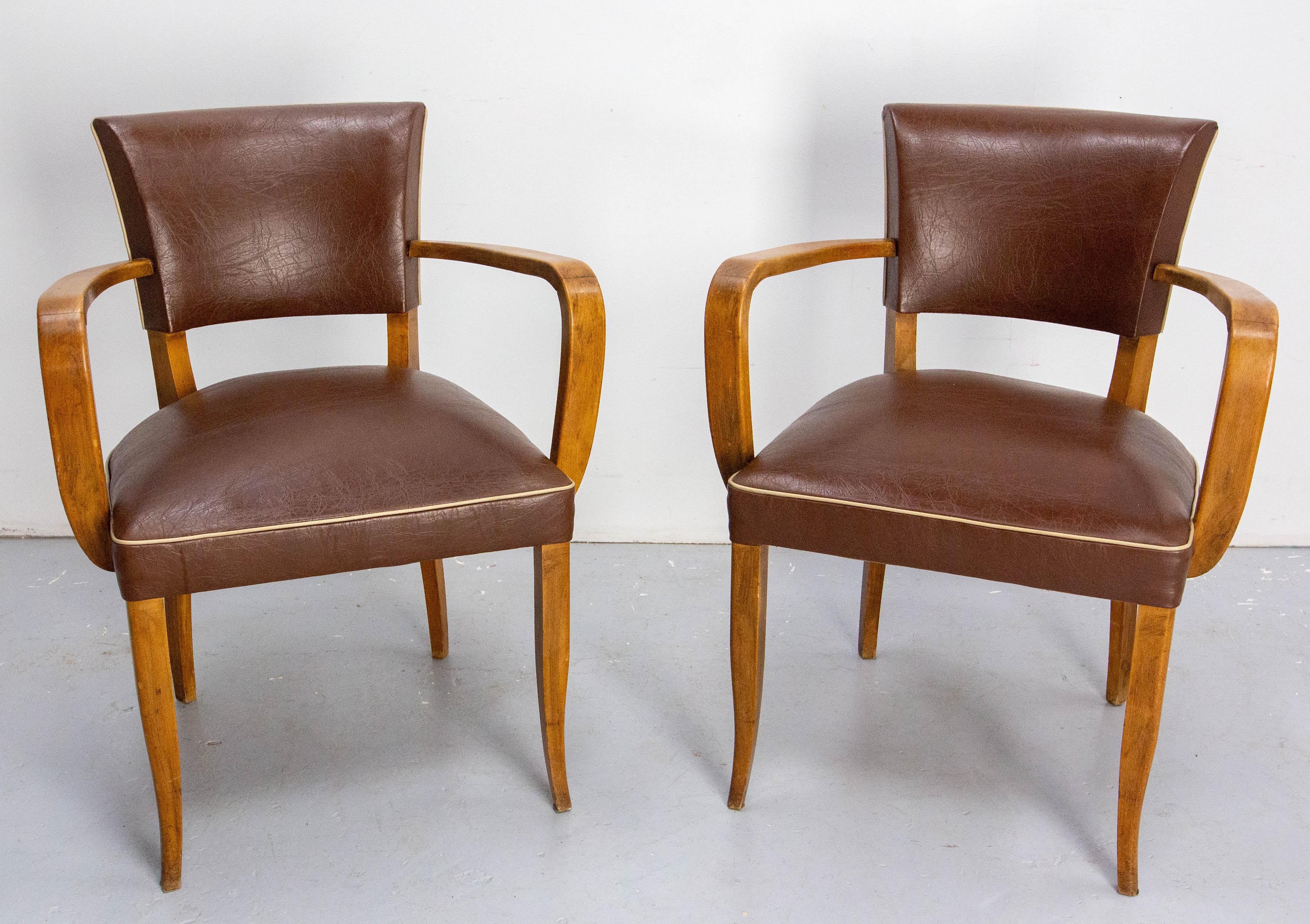 Pair of French Art Deco bridge chairs, circa 1930
Two open armchairs in brown textured sky and cream-coloured edging.
Like all bridge chairs from this period, the structure of the chairs retains a certain flexibility. 
The frames remains sound and