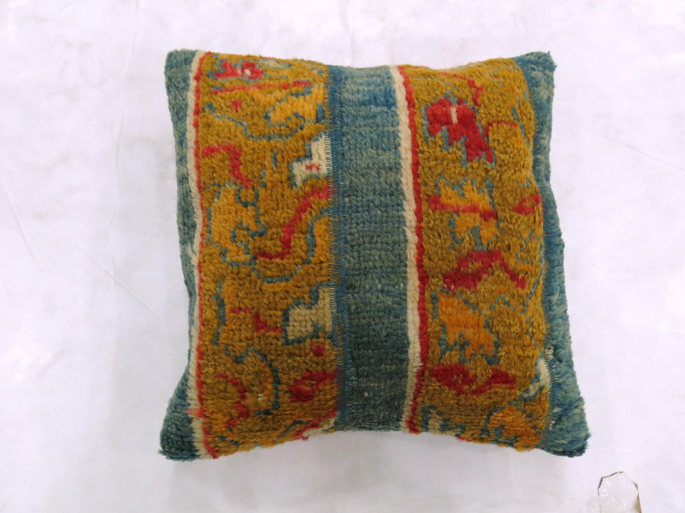 Pair of bright Turkish rug pillows measuring 17” x 17” and 17” x 18” respectively.