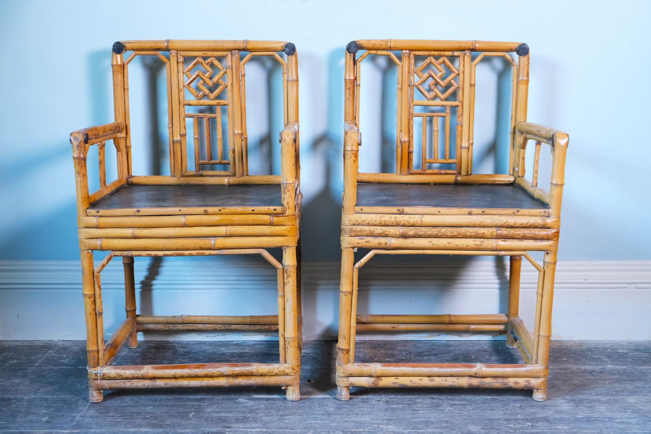 A pair of Brighton Pavilion Chinoiserie Bamboo armchairs, English, circa 1820.


Dimensions: H89.5 x W53 x D42 cm.