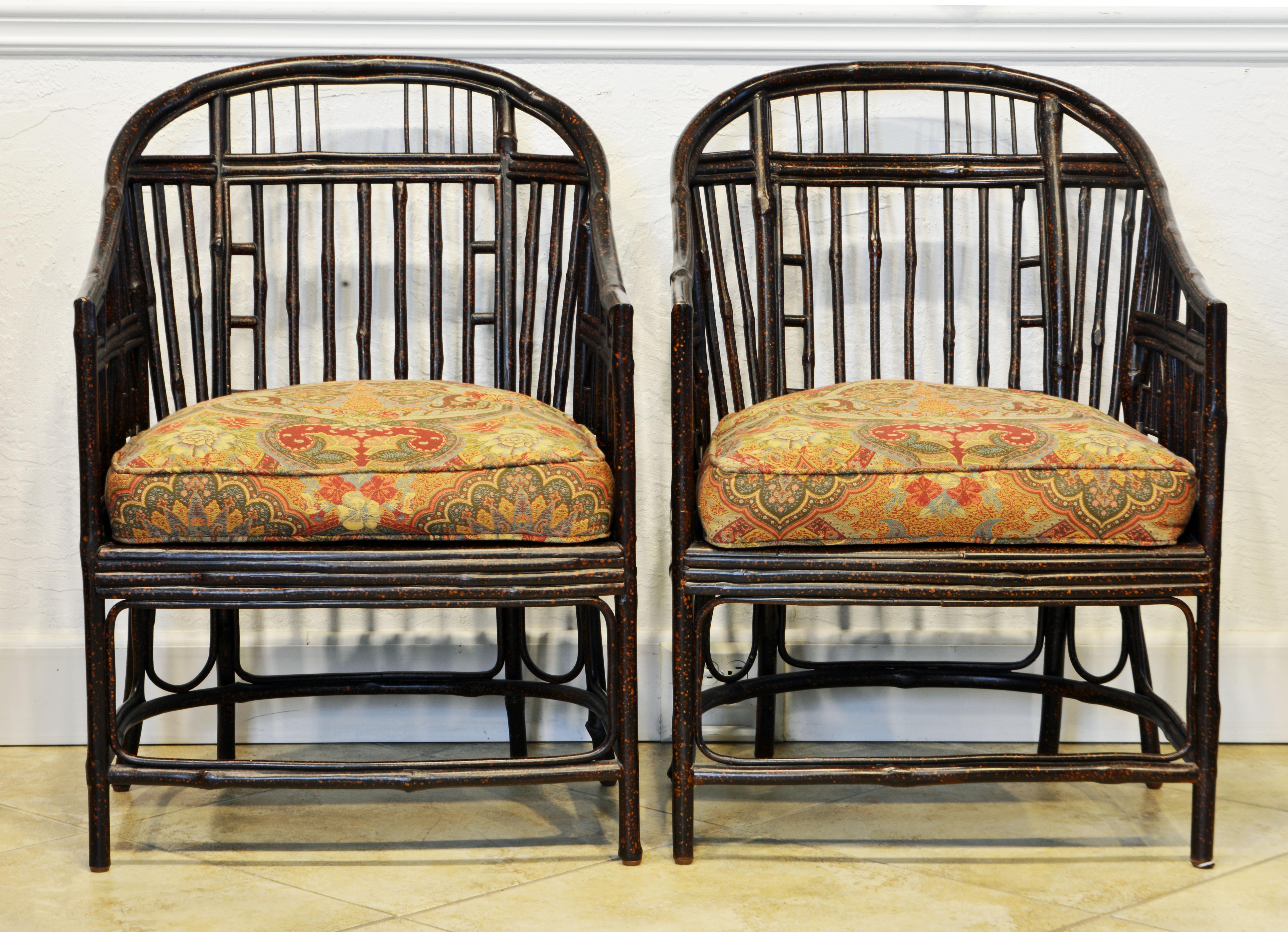 Of generous proportions these unusual Brighton Pavillion style chinoiserie bamboo chairs feature horse shoe top rails above backrests and sides with bamboo open work incorporating Chinese symbols. The seats are covered with comfortable cushions of