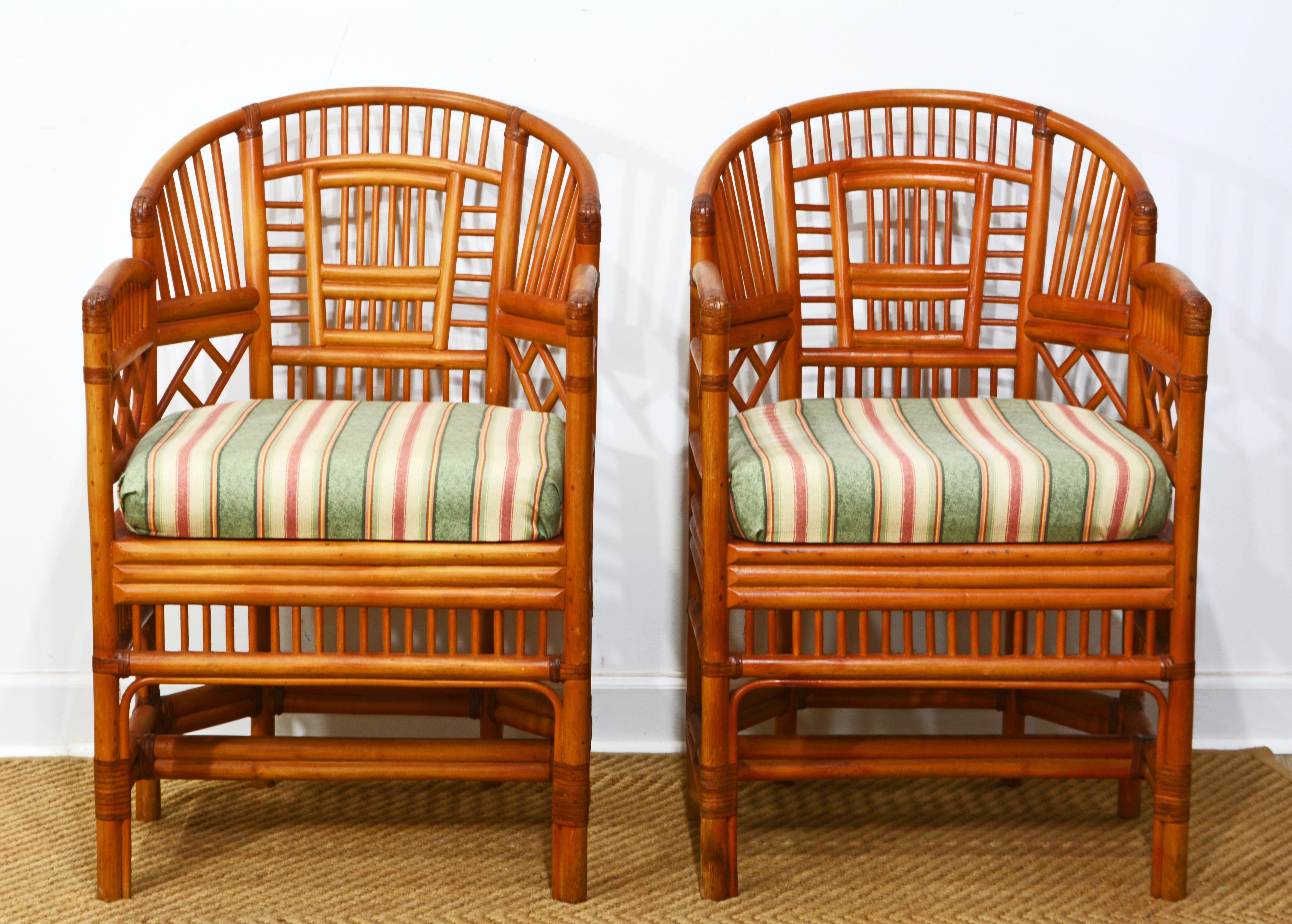 This pair of Chinoiserie Chippendale horse shoe back rattan and cane chairs often named Brighton Pavillion style chairs have an iconic quality and the model can be found with a variation of designs and materials. These chairs are very well
