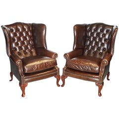 Pair of Brights of Nettlebed Chesterfield Brown Leather Wing Armchairs