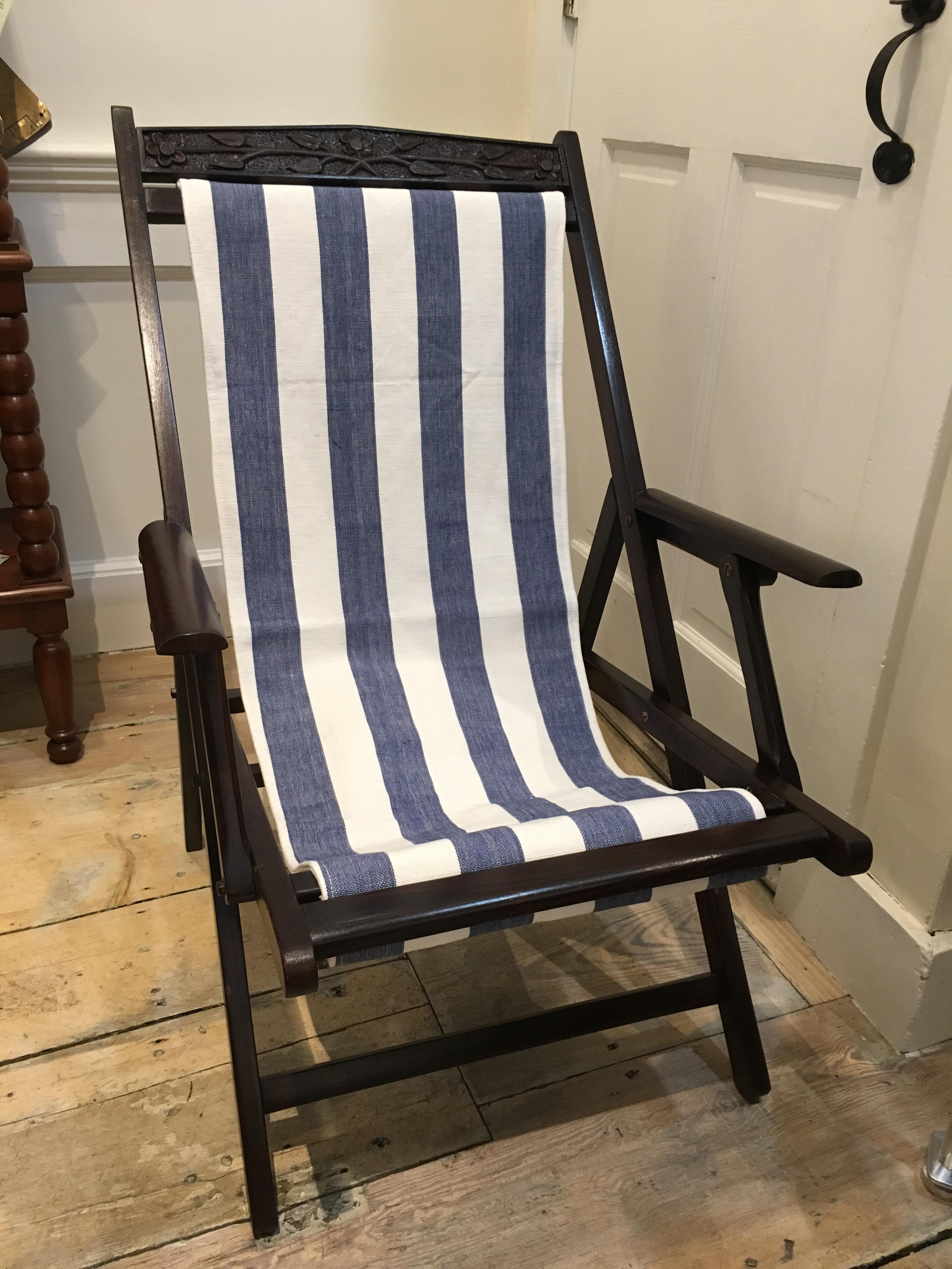 Pair of British Campaign Folding Teak Patio or Veranda Arm Chairs In Good Condition In Nantucket, MA