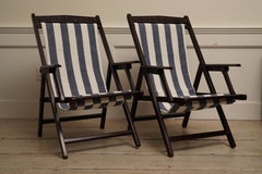 Paire de fauteuils de terrasse ou de véranda en teck pliants de la campagne britannique