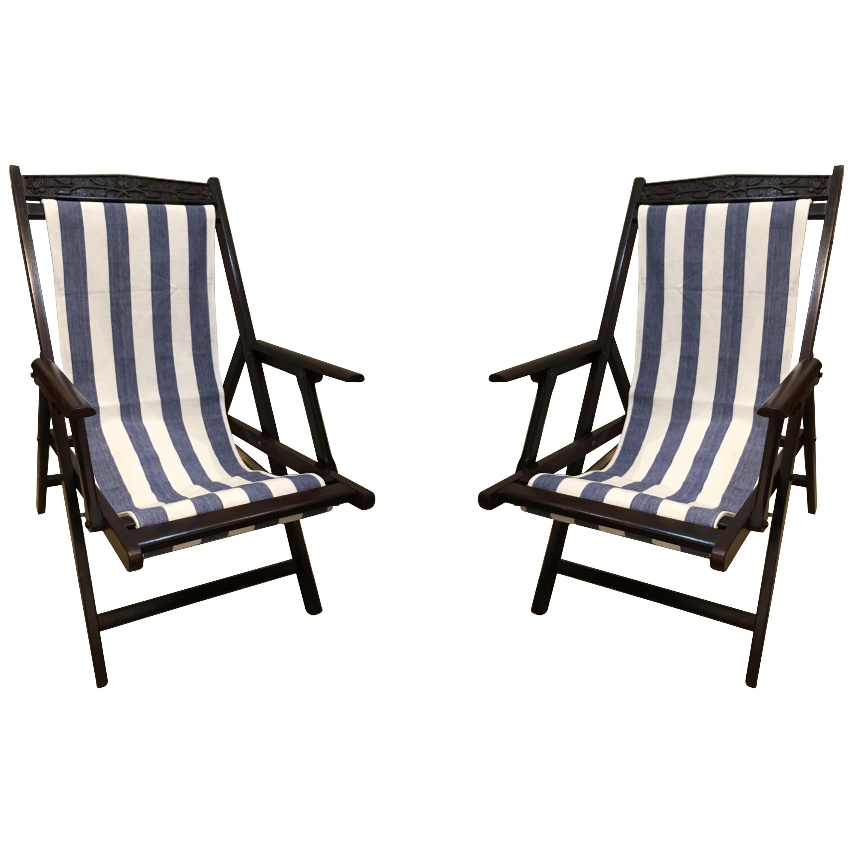 Pair of British Campaign Folding Teak Patio or Veranda Arm Chairs