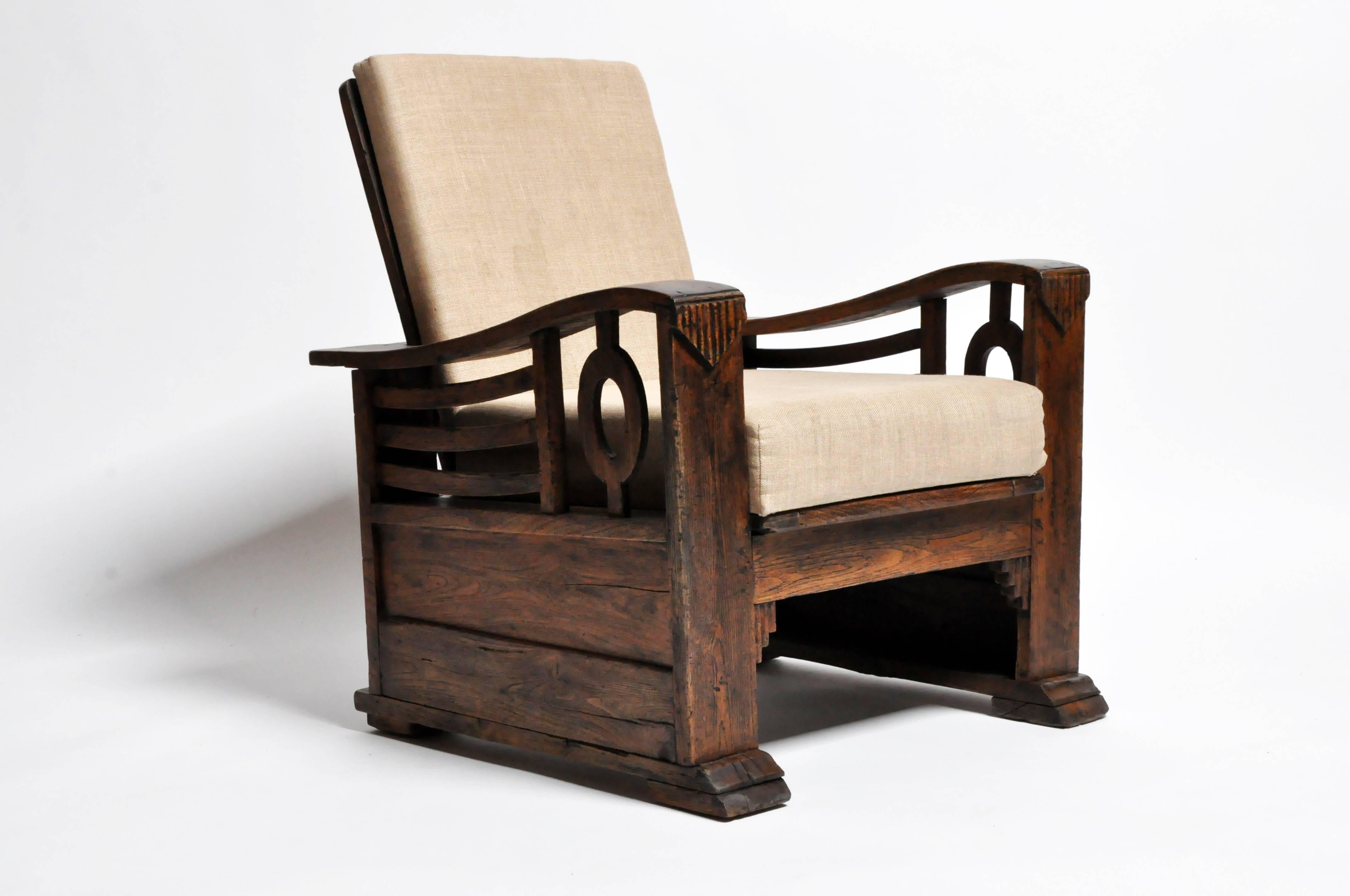 This handsome pair of British Colonial Art Deco chair is from India and made from teak wood, circa 1960.