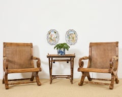 Pair of British Colonial Style Carved Caned Plantation Chairs