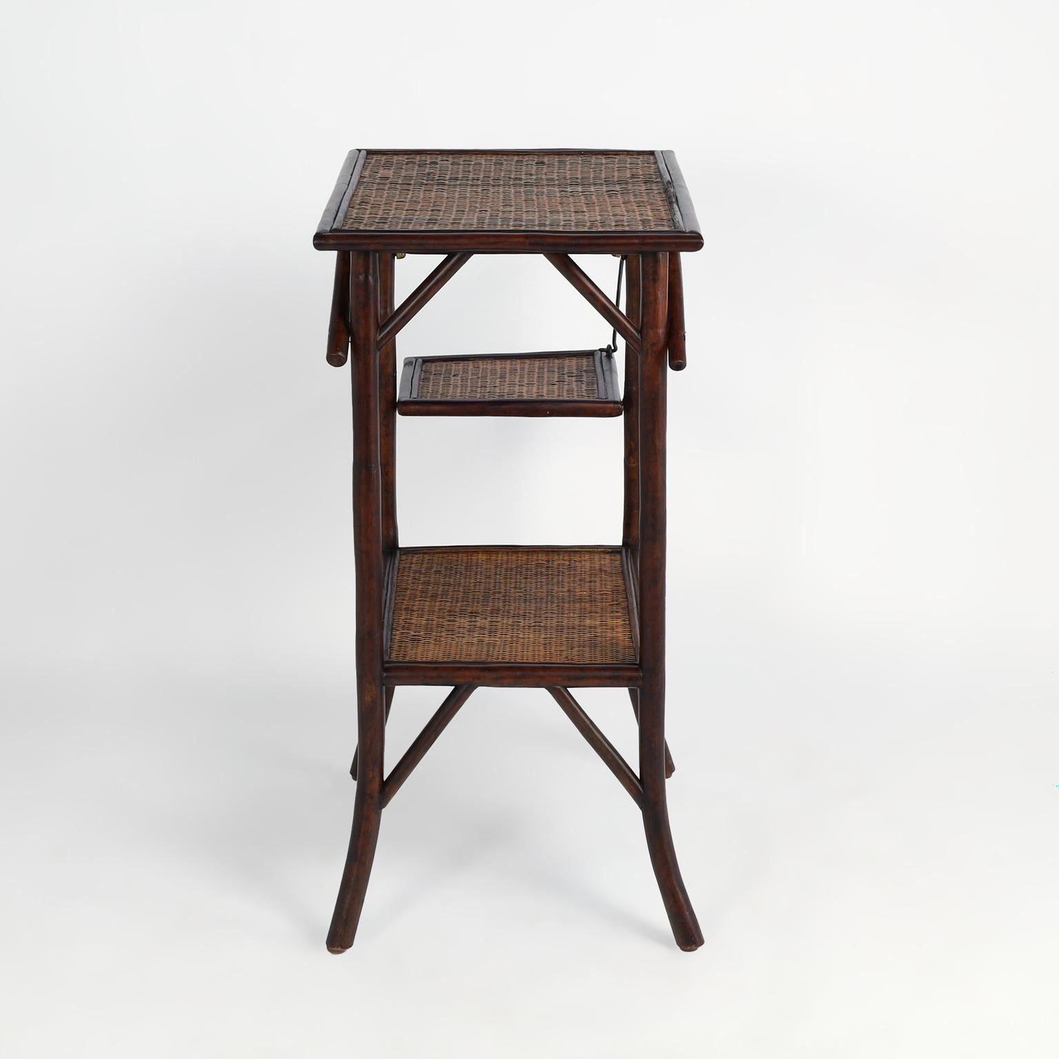 20th Century Pair of British Colonial Style Faux Bamboo and Grasscloth Two Tiered Stands