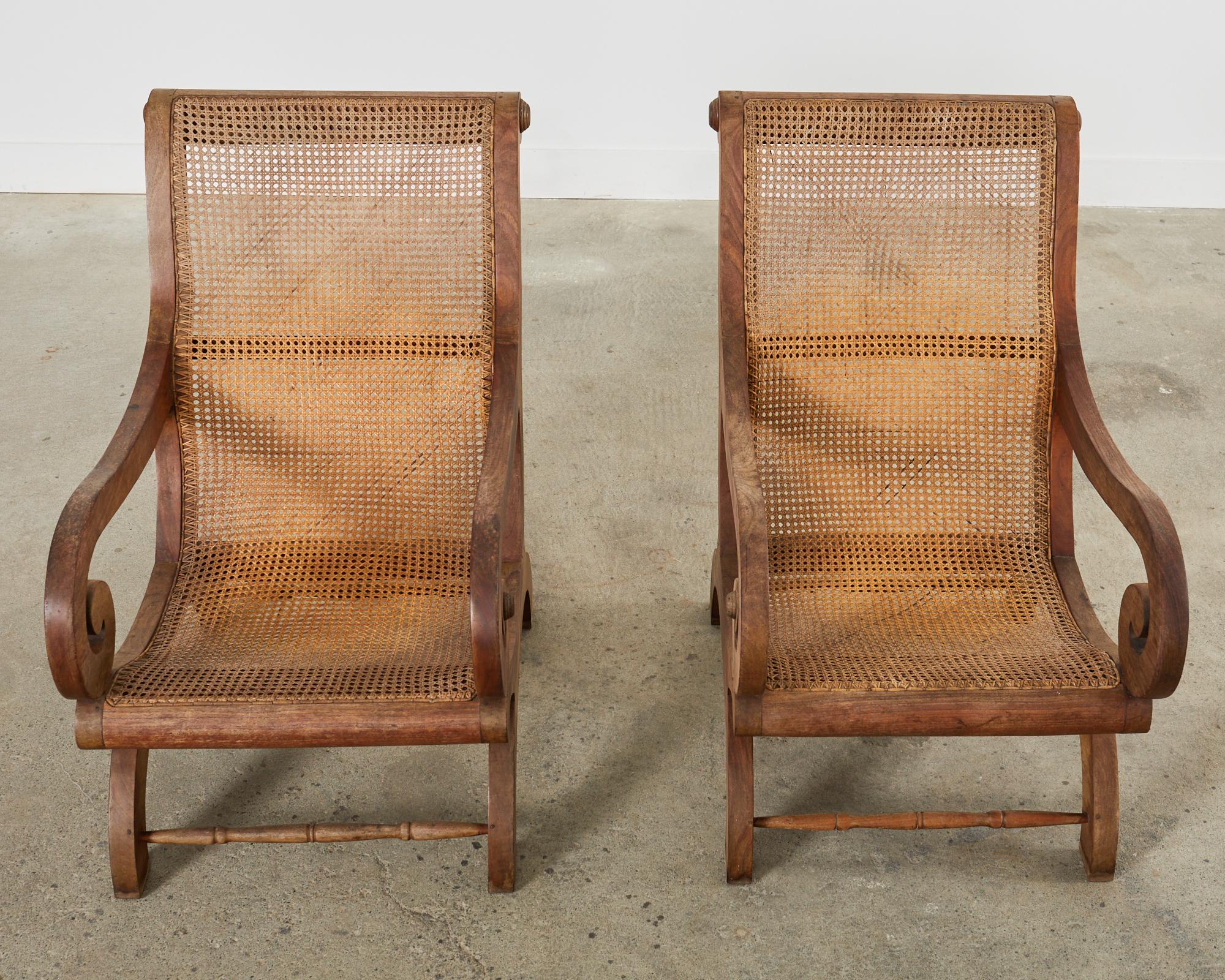 Southeast Asian Pair of British Colonial Style Plantation Lounge Chairs with Ottomans For Sale