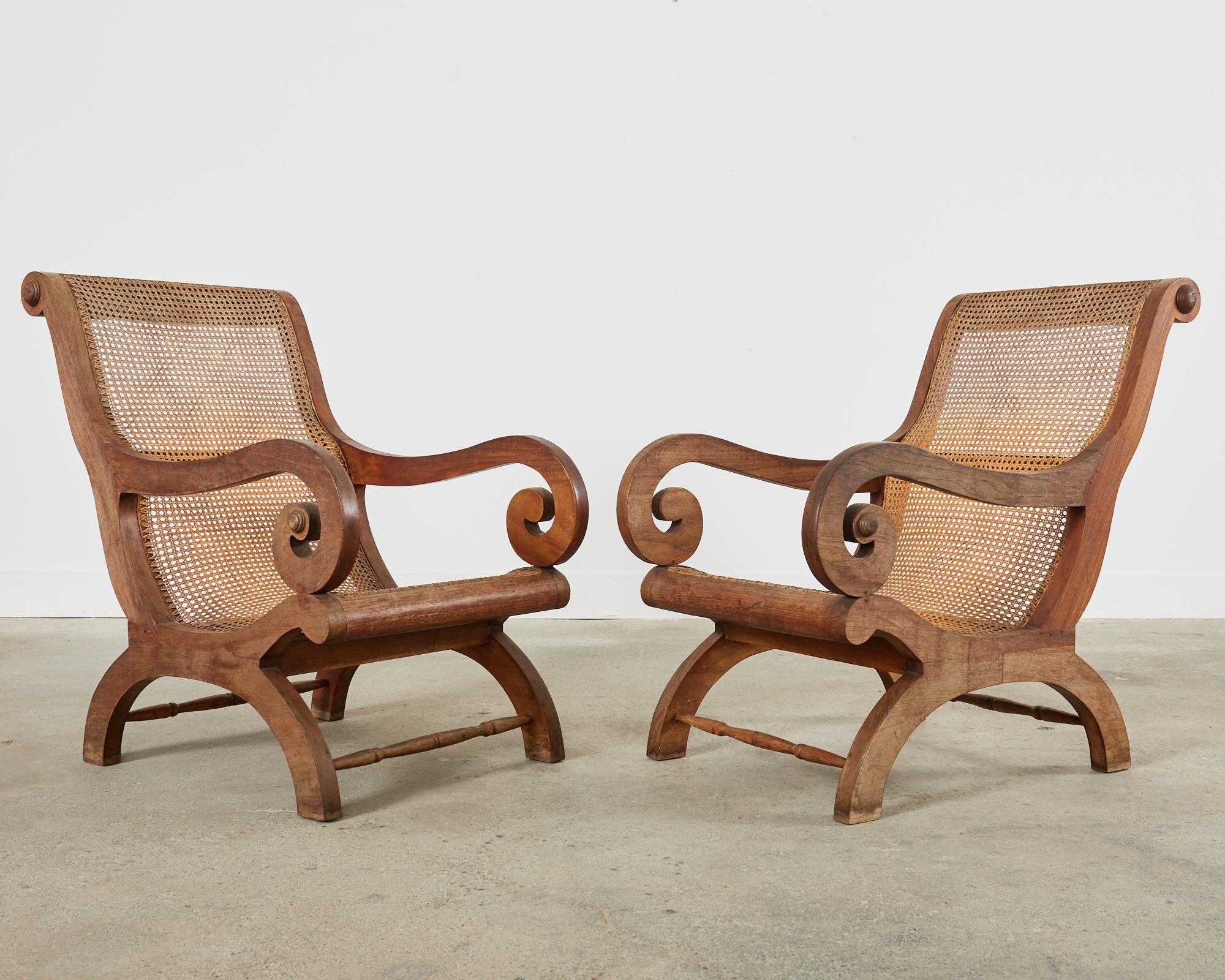 20th Century Pair of British Colonial Style Plantation Lounge Chairs with Ottomans For Sale