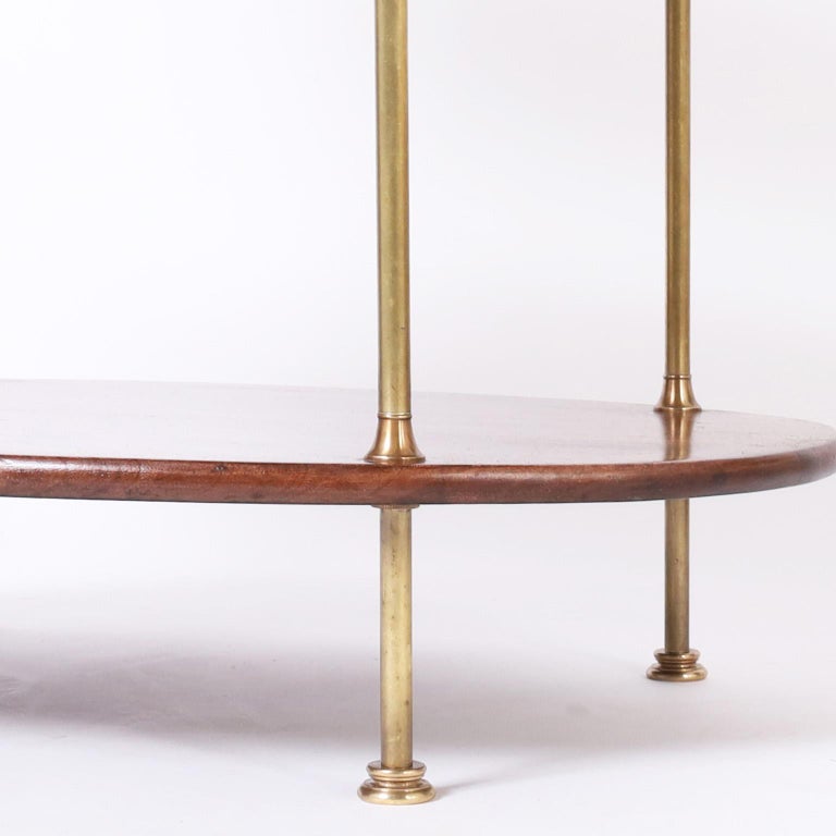 Pair of British Colonial Style Three Tiered Oval Stands For Sale at 1stDibs