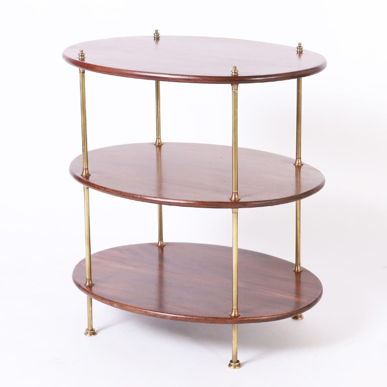 Pair of British Colonial Style Three Tiered Oval Stands For Sale at 1stDibs