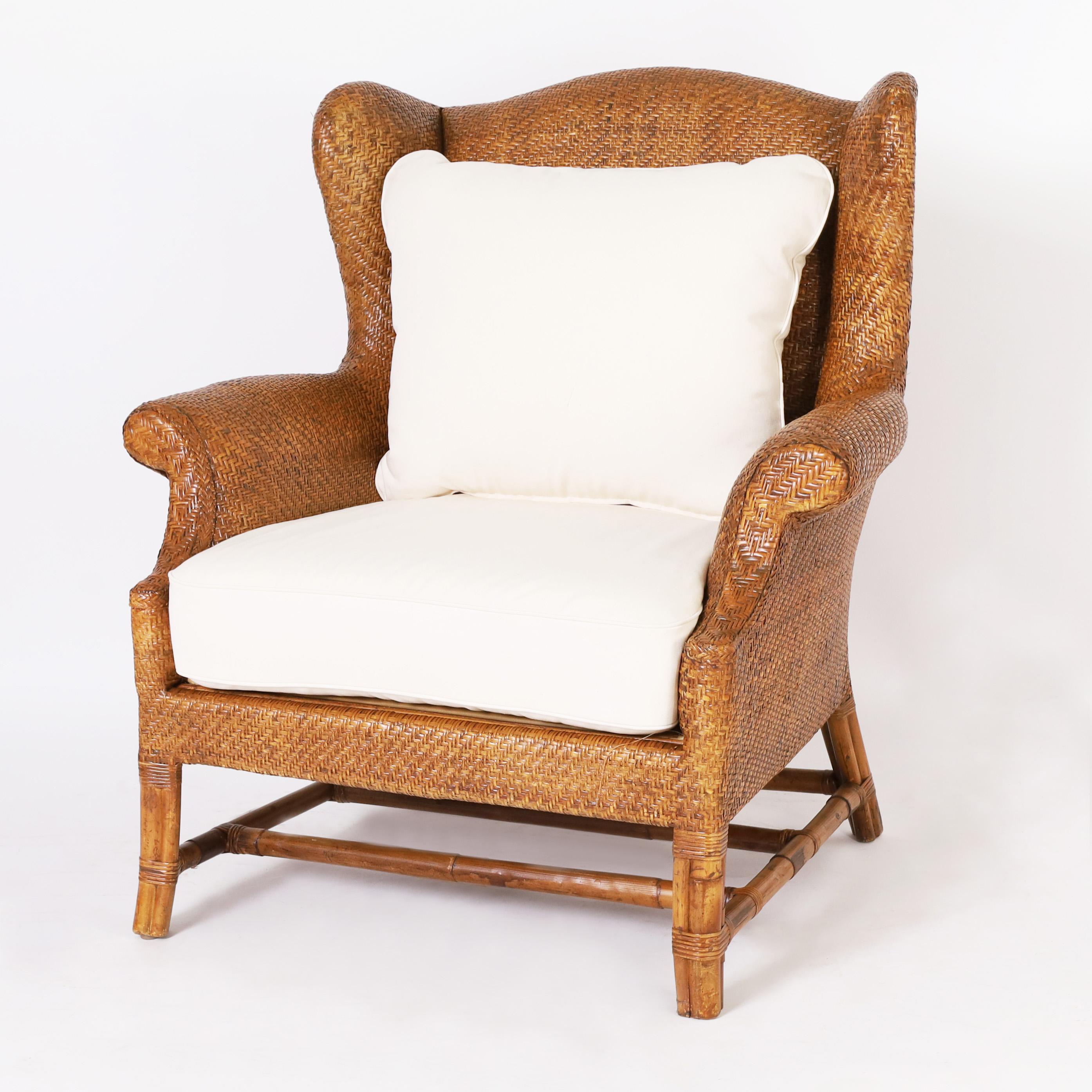 Woven Pair of British Colonial Style Wingback Armchairs by Baker For Sale