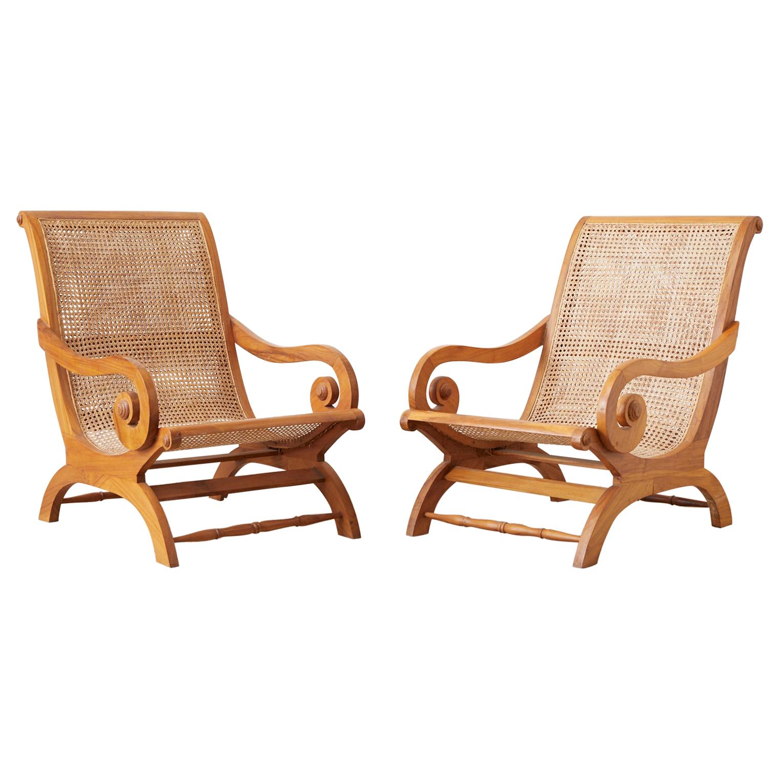 Pair of British Colonial Teak and Cane Plantation Chairs