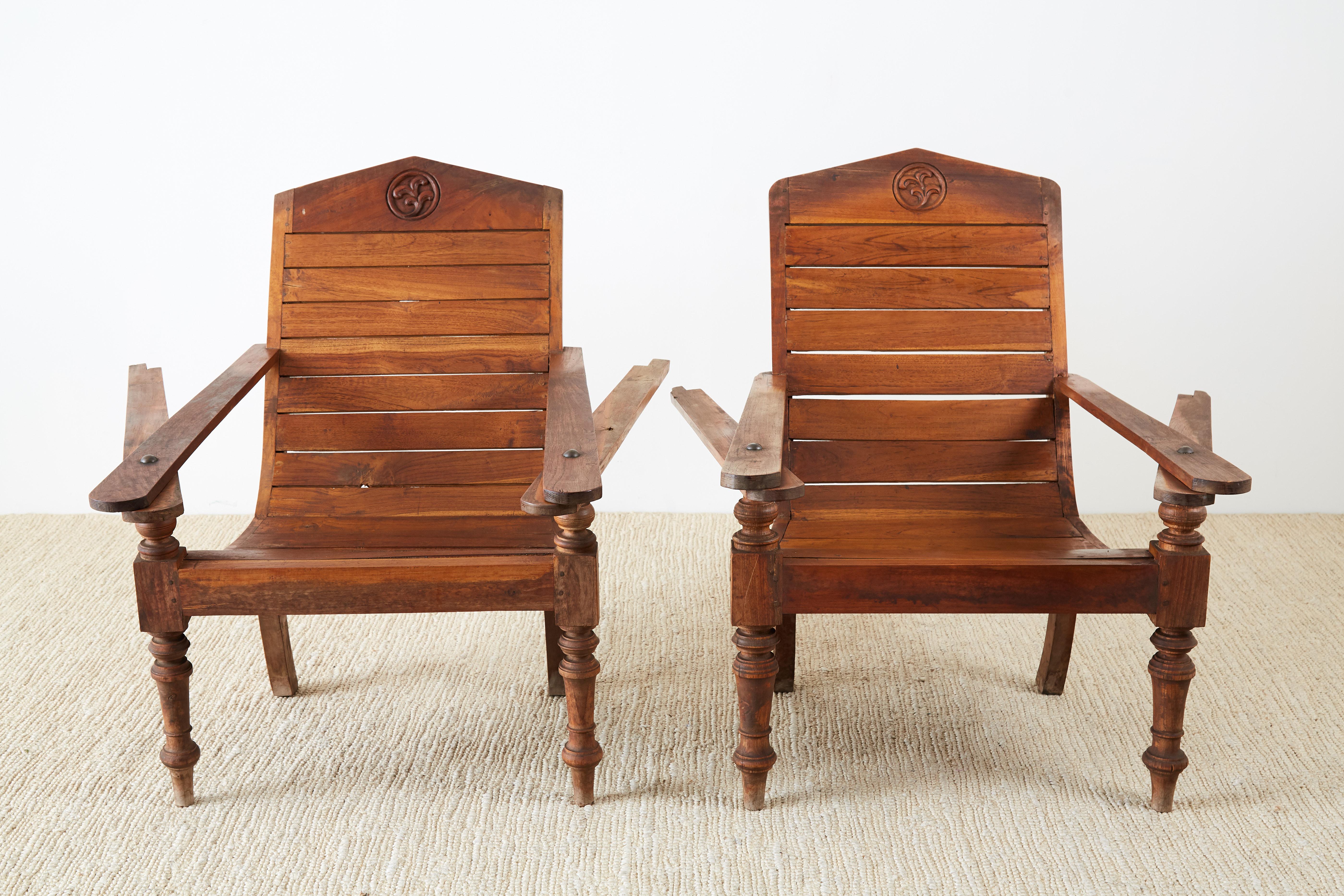 Pair of British Colonial Teak Plantation Chairs 1