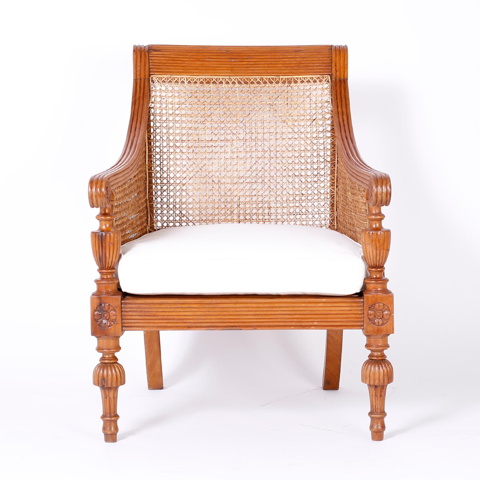 Cane Pair of British Colonial Teak Wood Armchairs