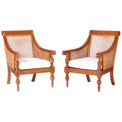 Pair of British Colonial Teak Wood Armchairs