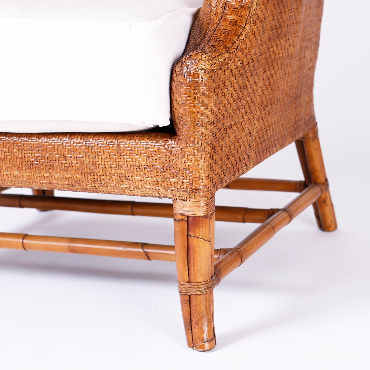 20th Century Pair of British Colonial Wicker and Bamboo Wing Chairs by Baker