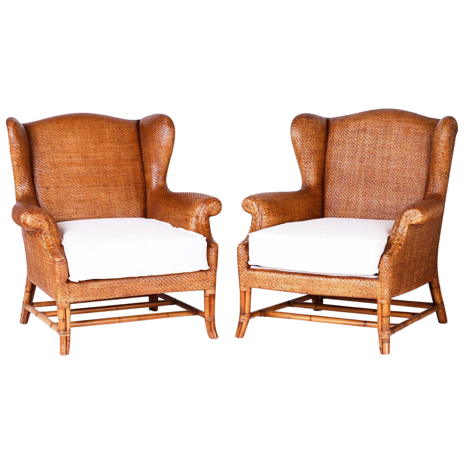 Pair of British Colonial Wicker and Bamboo Wing Chairs by Baker