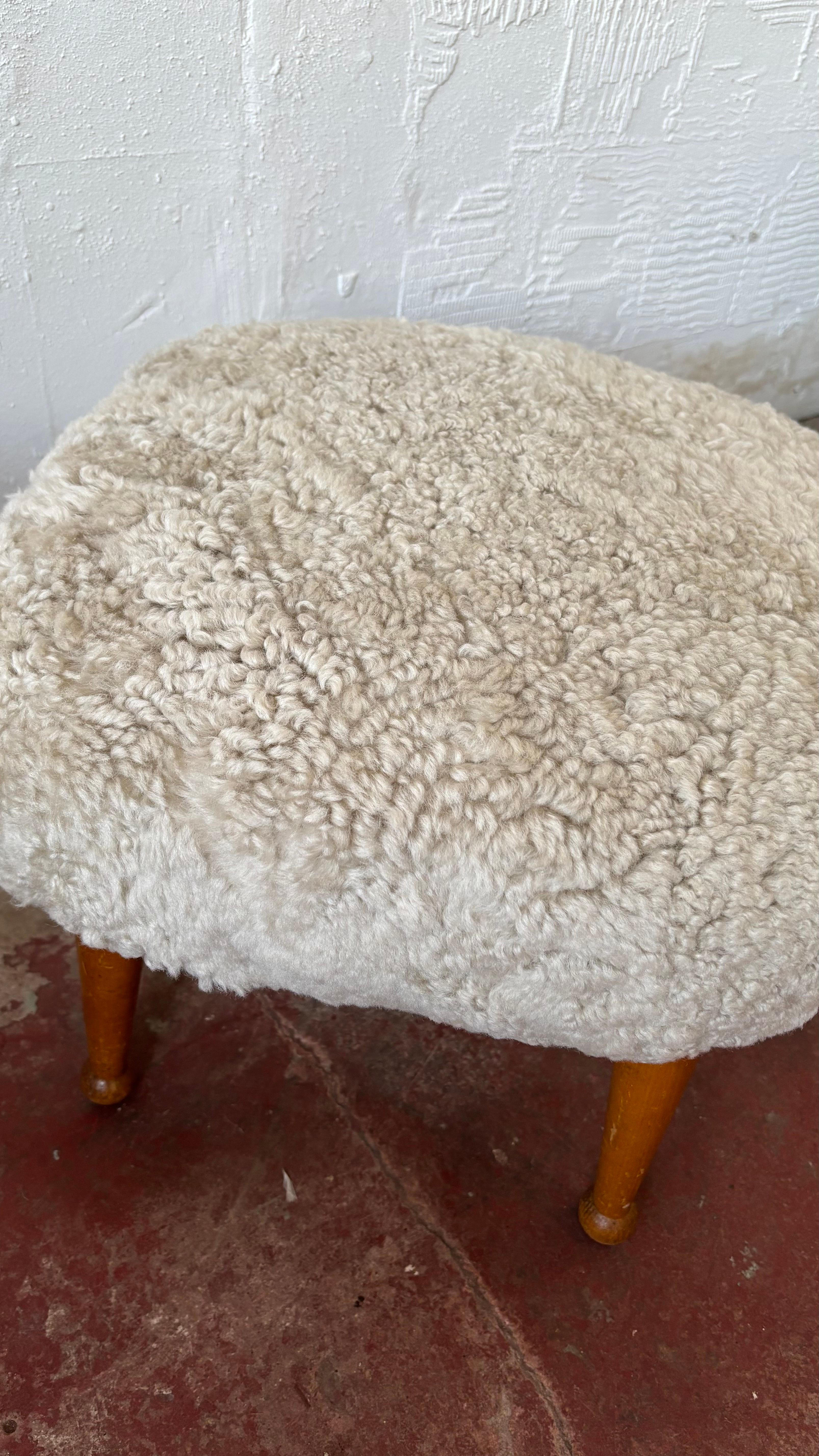 Mid-20th Century Pair of British Shearling Footstools For Sale