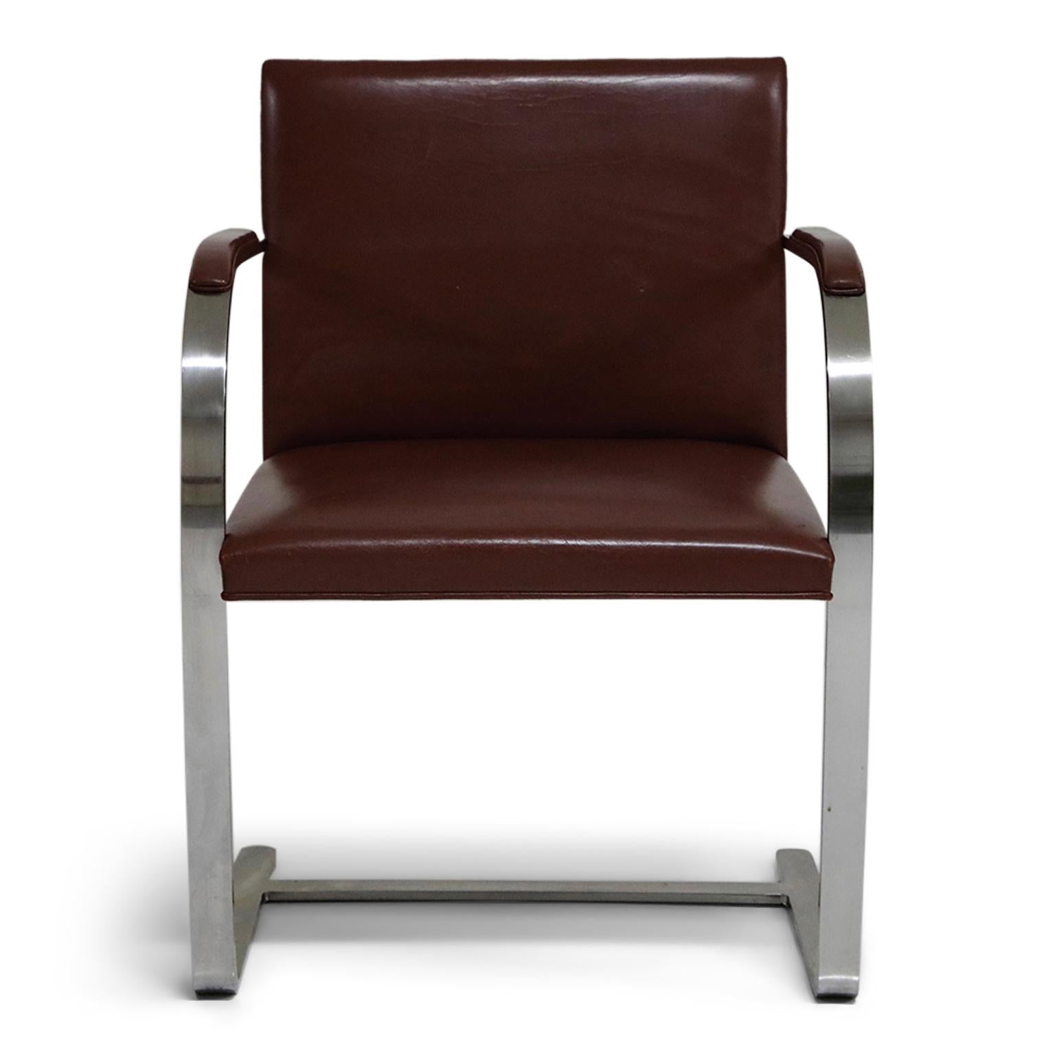 Rare original early production Knoll International 'Brno' Chairs in an incredible burgundy leather. Priced as a pair, these collectible 2nd generation productions by Knoll International have an attractive and lovely patina to the leather and is