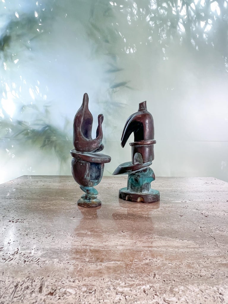 A pair of beautifully patinated abstract bronzes. Unfortunately unsigned. 
Measurements: 5.5 x 3.5 x 10.5h / 3.5 x 4 x 11h.